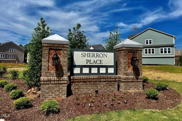 a view of a swimming pool with an outdoor space and seating area