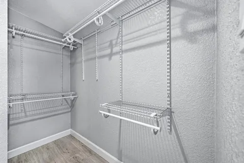 a view of a room with racks on the wall