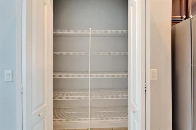 an aerial view of house with yard swimming pool and outdoor seating