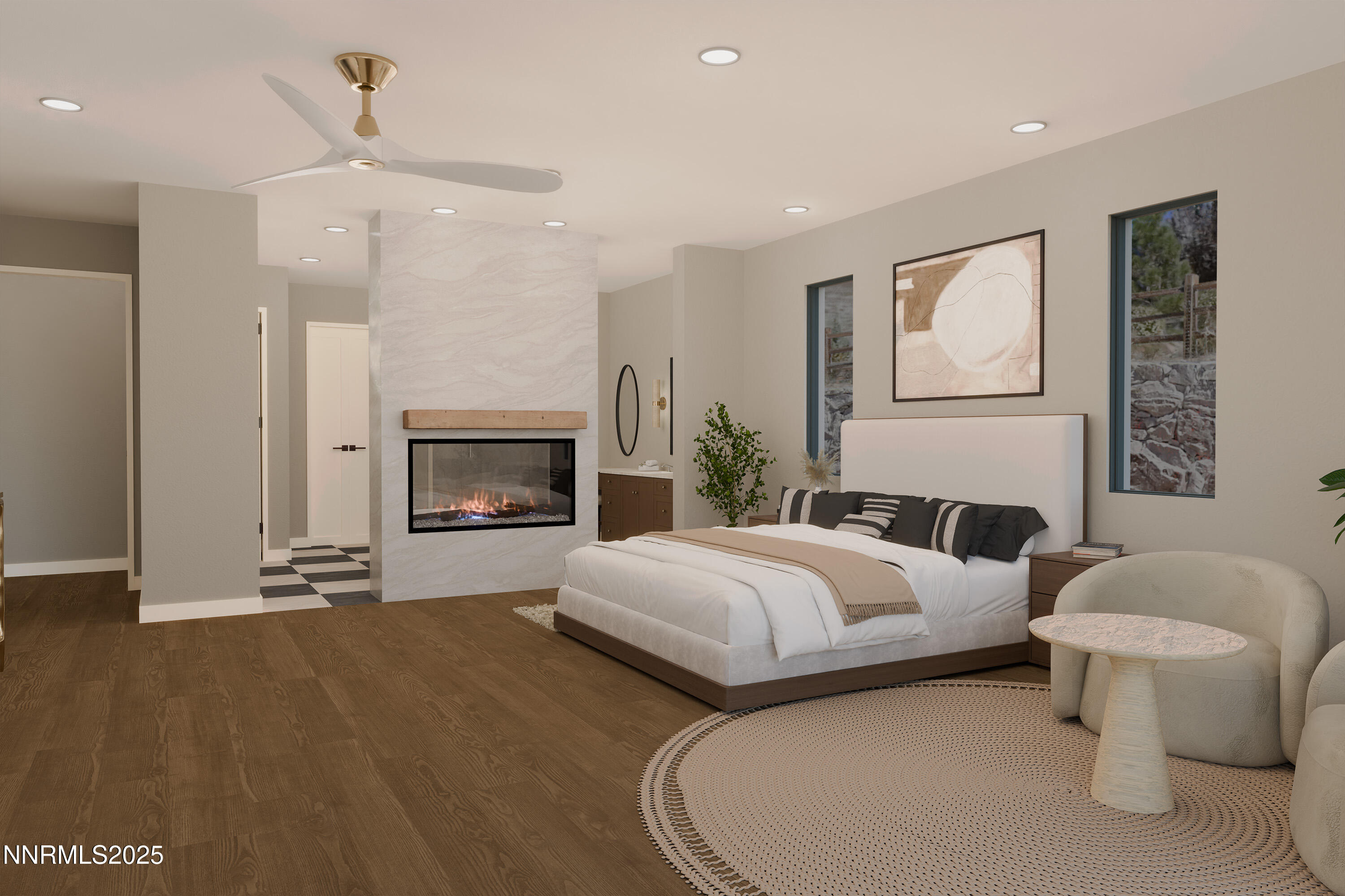 8674 Eagle Chase Trail, Unit PRIVATE GATED COMMY Reno, NV 89523 - Photo 10 of 18 a spacious bedroom with a bed and a fireplace