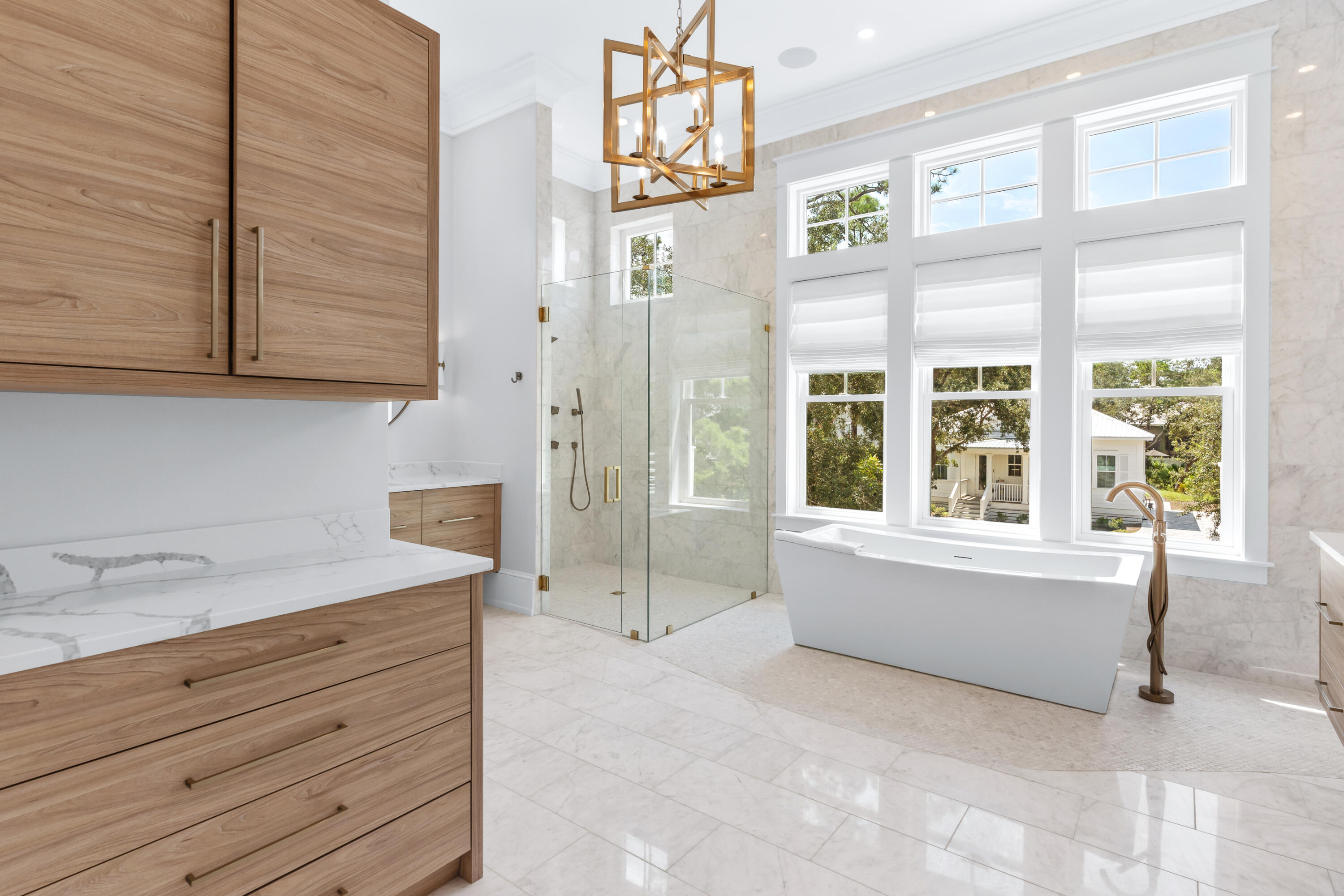 33 Spotted Dolphin Road Santa Rosa Beach, FL 32459 - Photo 17 of 42 a bathroom with a tub sink and mirror
