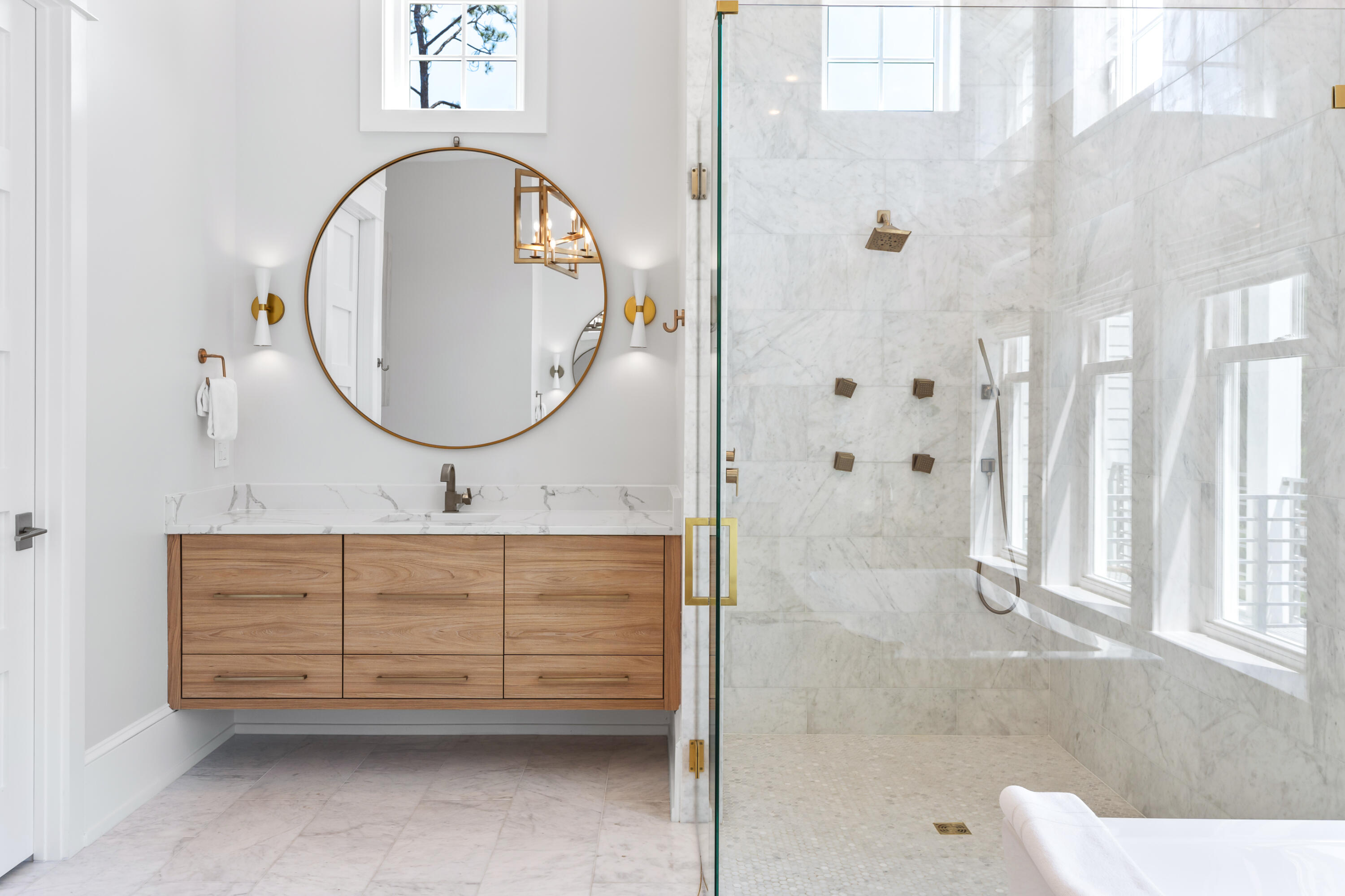 33 Spotted Dolphin Road Santa Rosa Beach, FL 32459 - Photo 18 of 42 a bathroom with a sink a mirror a vanity and a shower