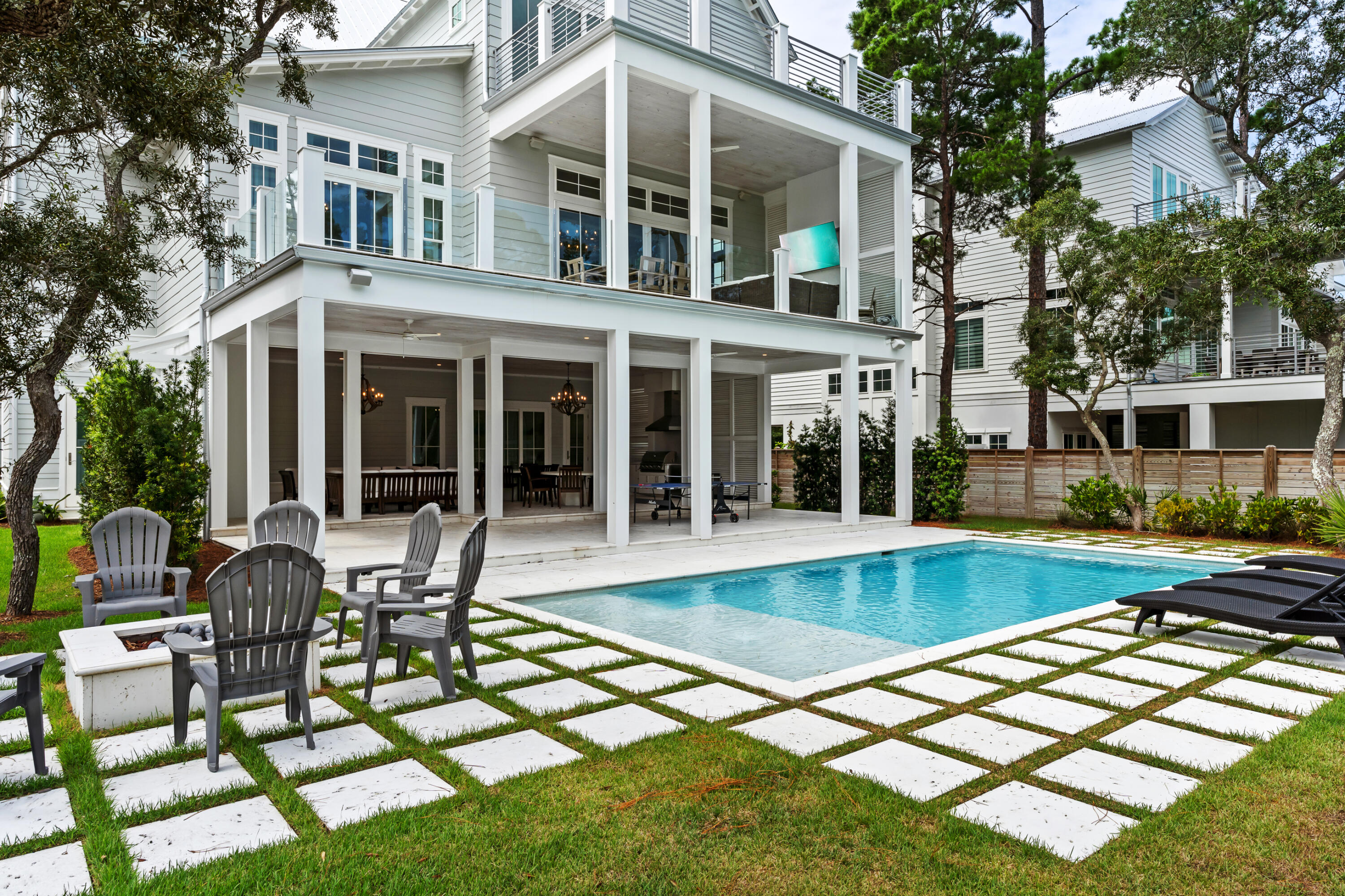 33 Spotted Dolphin Road Santa Rosa Beach, FL 32459 - Photo 2 of 42 a view of a house with swimming pool and sitting area
