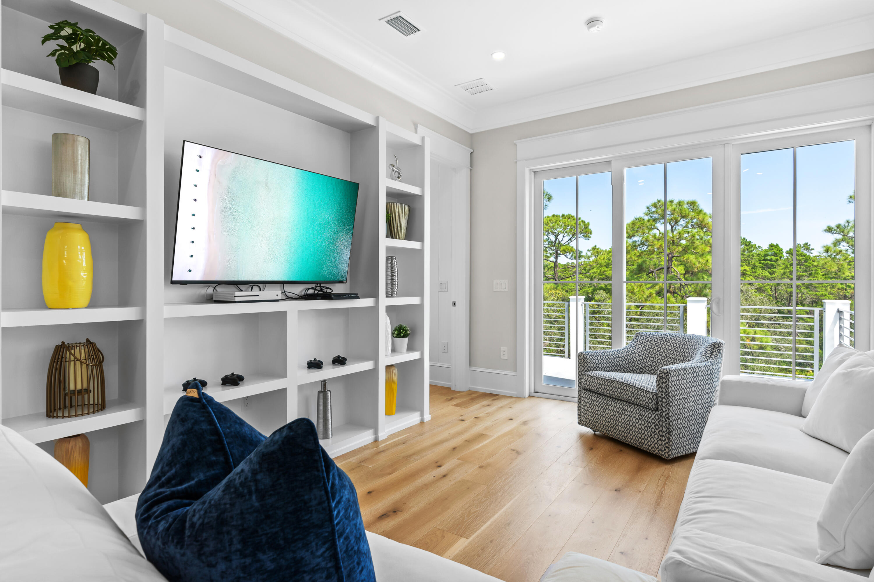 33 Spotted Dolphin Road Santa Rosa Beach, FL 32459 - Photo 23 of 42 a living room with furniture and a flat screen tv