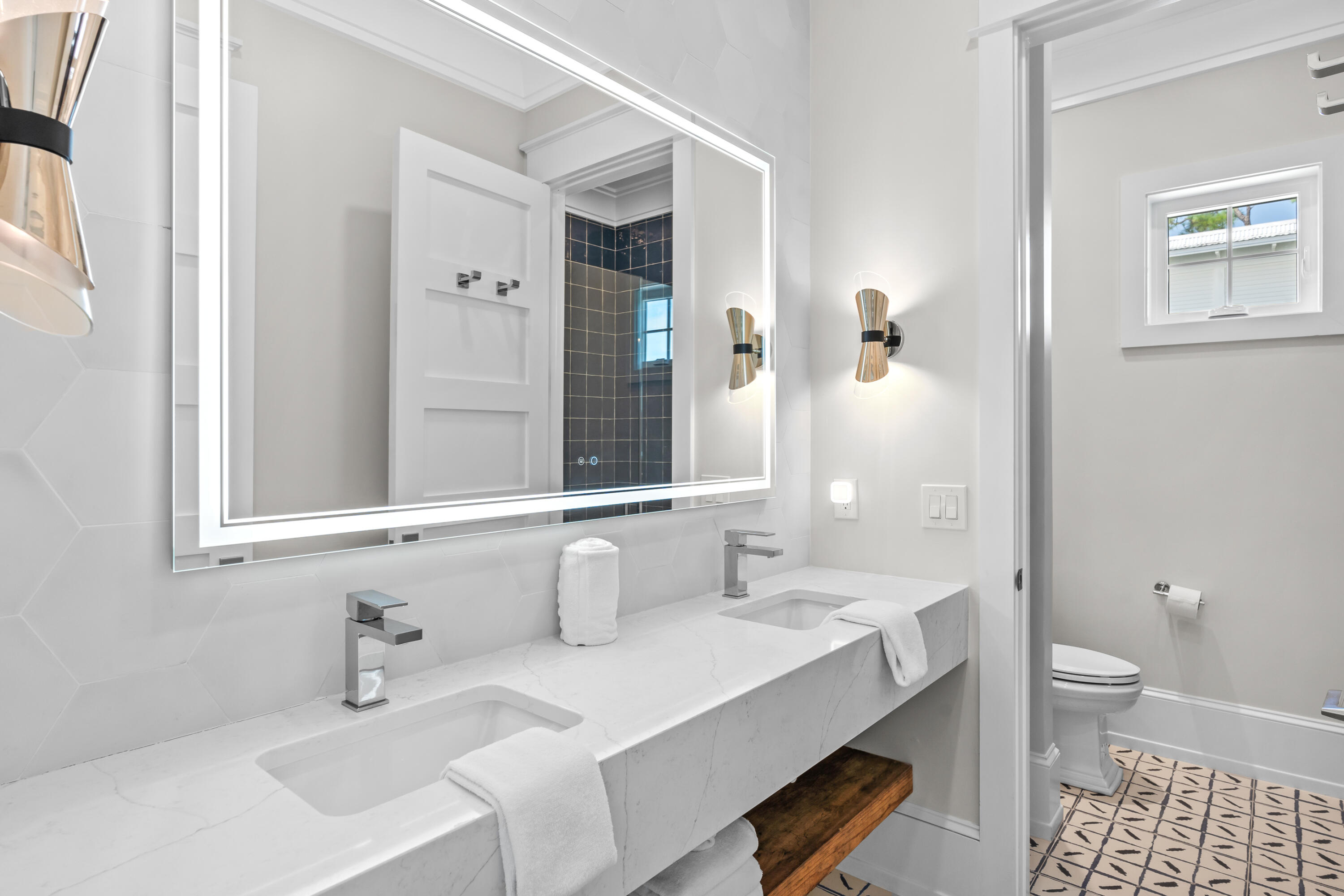 33 Spotted Dolphin Road Santa Rosa Beach, FL 32459 - Photo 25 of 42 a bathroom with a sink and a mirror