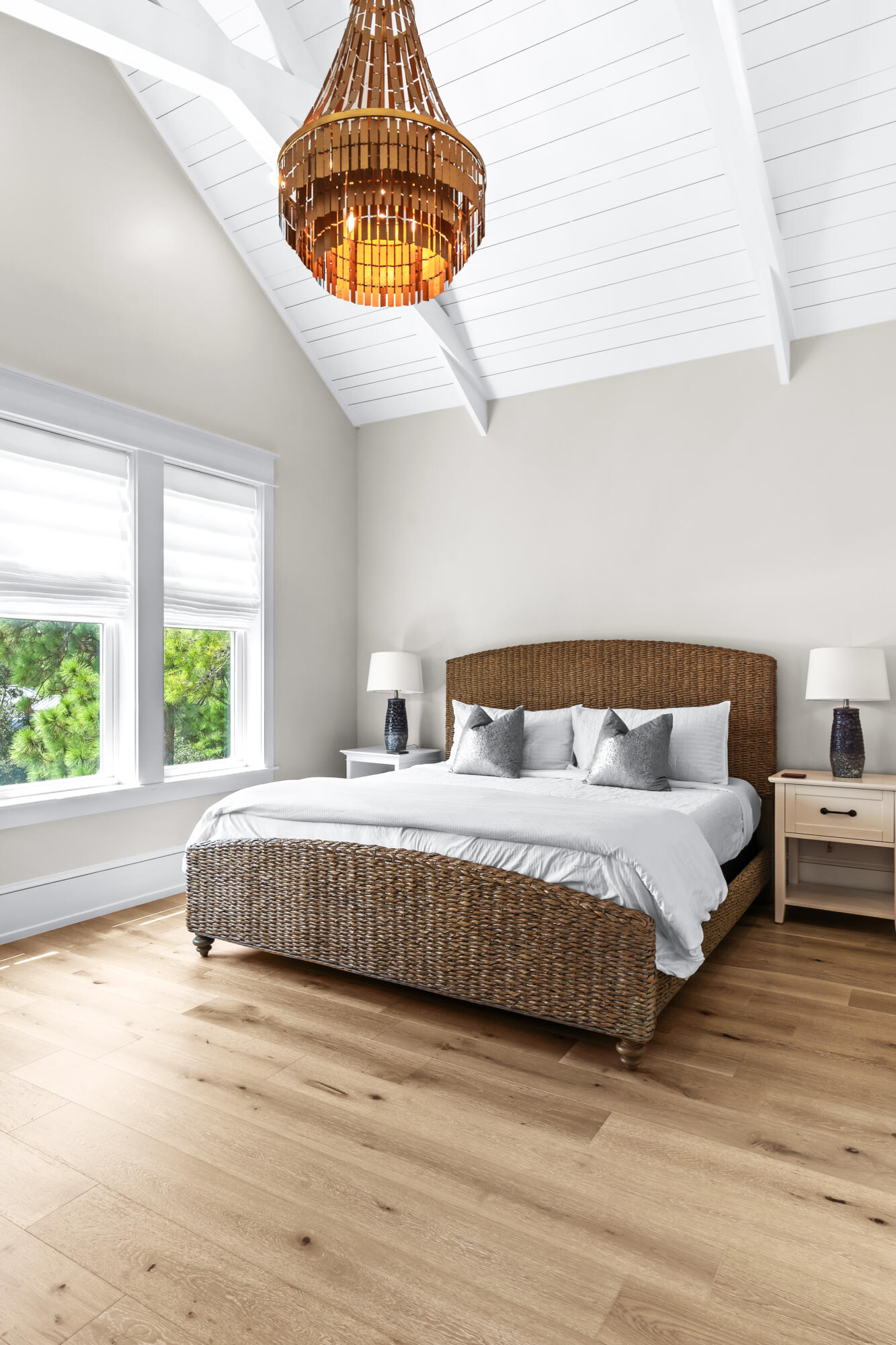 33 Spotted Dolphin Road Santa Rosa Beach, FL 32459 - Photo 29 of 42 a spacious bedroom with a bed and a chandelier