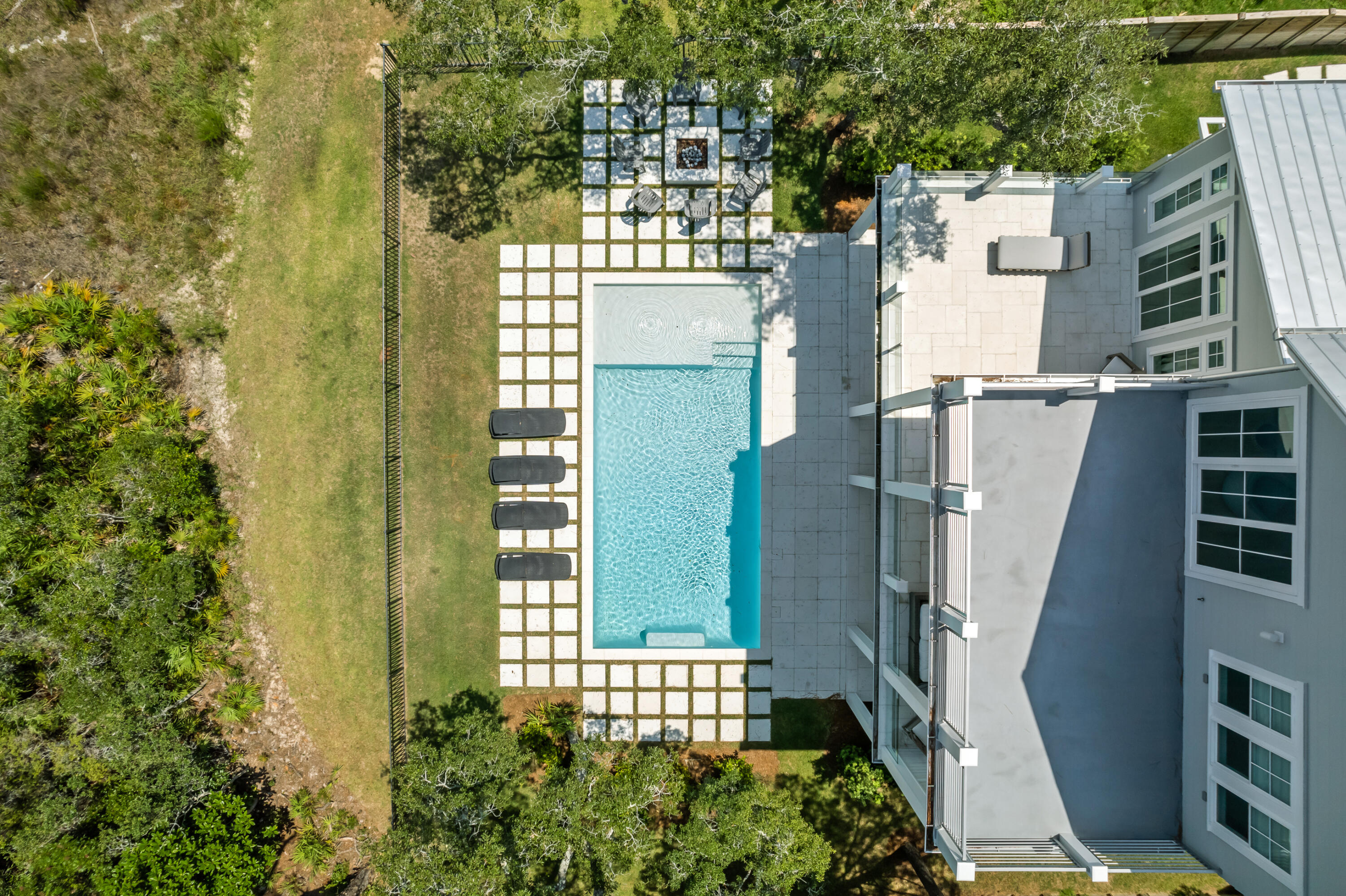 33 Spotted Dolphin Road Santa Rosa Beach, FL 32459 - Photo 40 of 42 an aerial view of a house with outdoor space and trees in the background