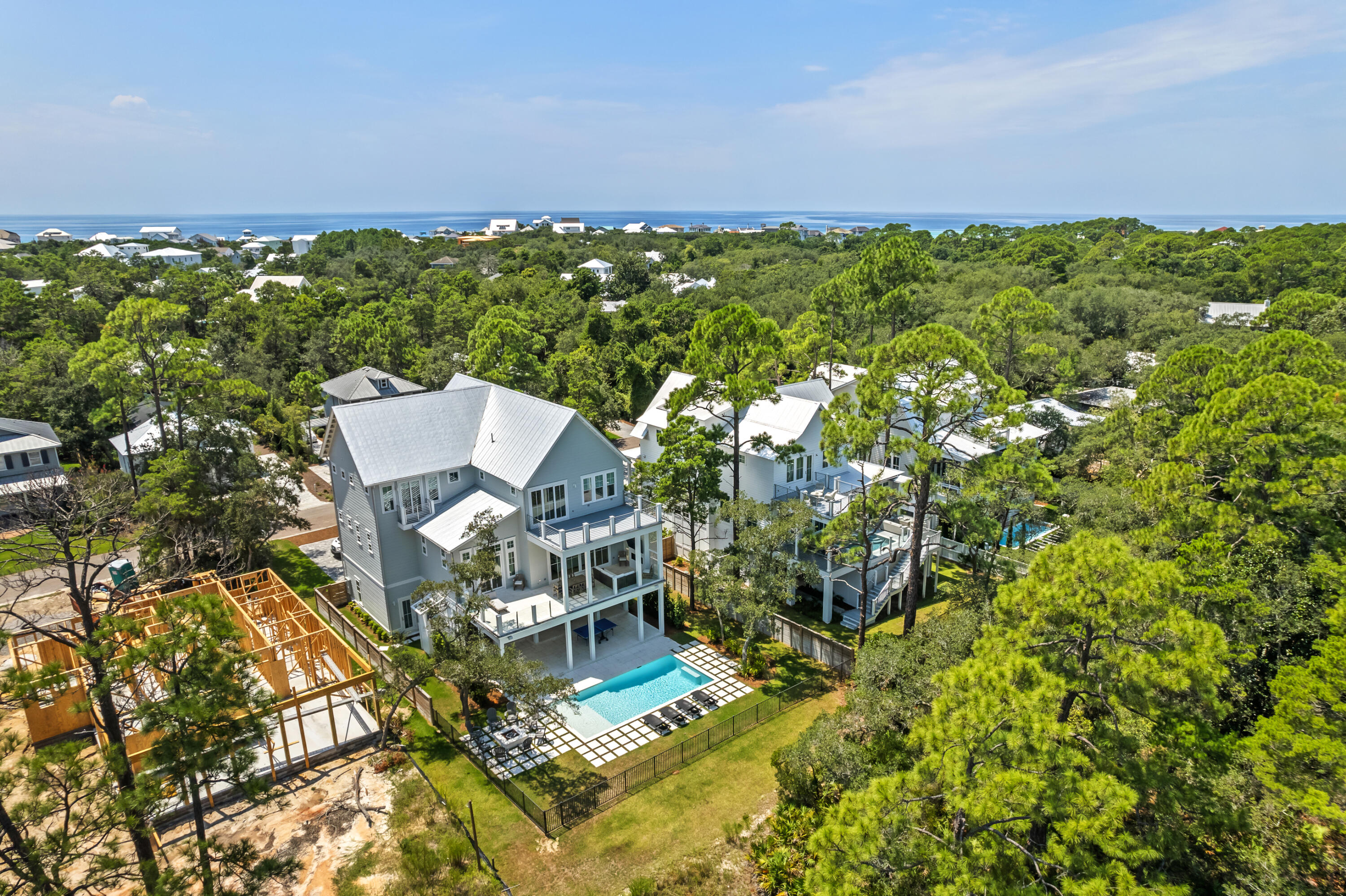33 Spotted Dolphin Road Santa Rosa Beach, FL 32459 - Photo 41 of 42 a view of a balcony with an outdoor space and seating area