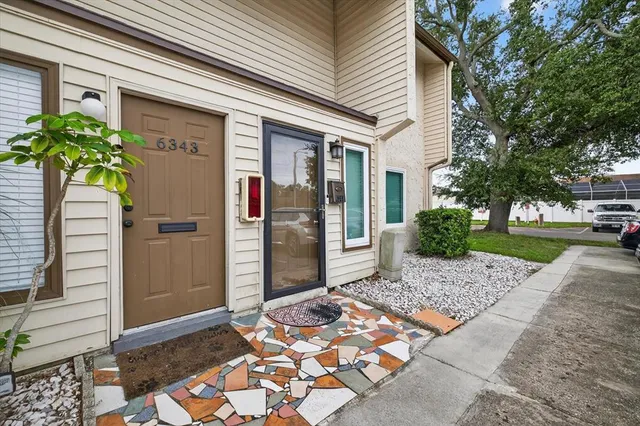 a view of a entryway door front of house