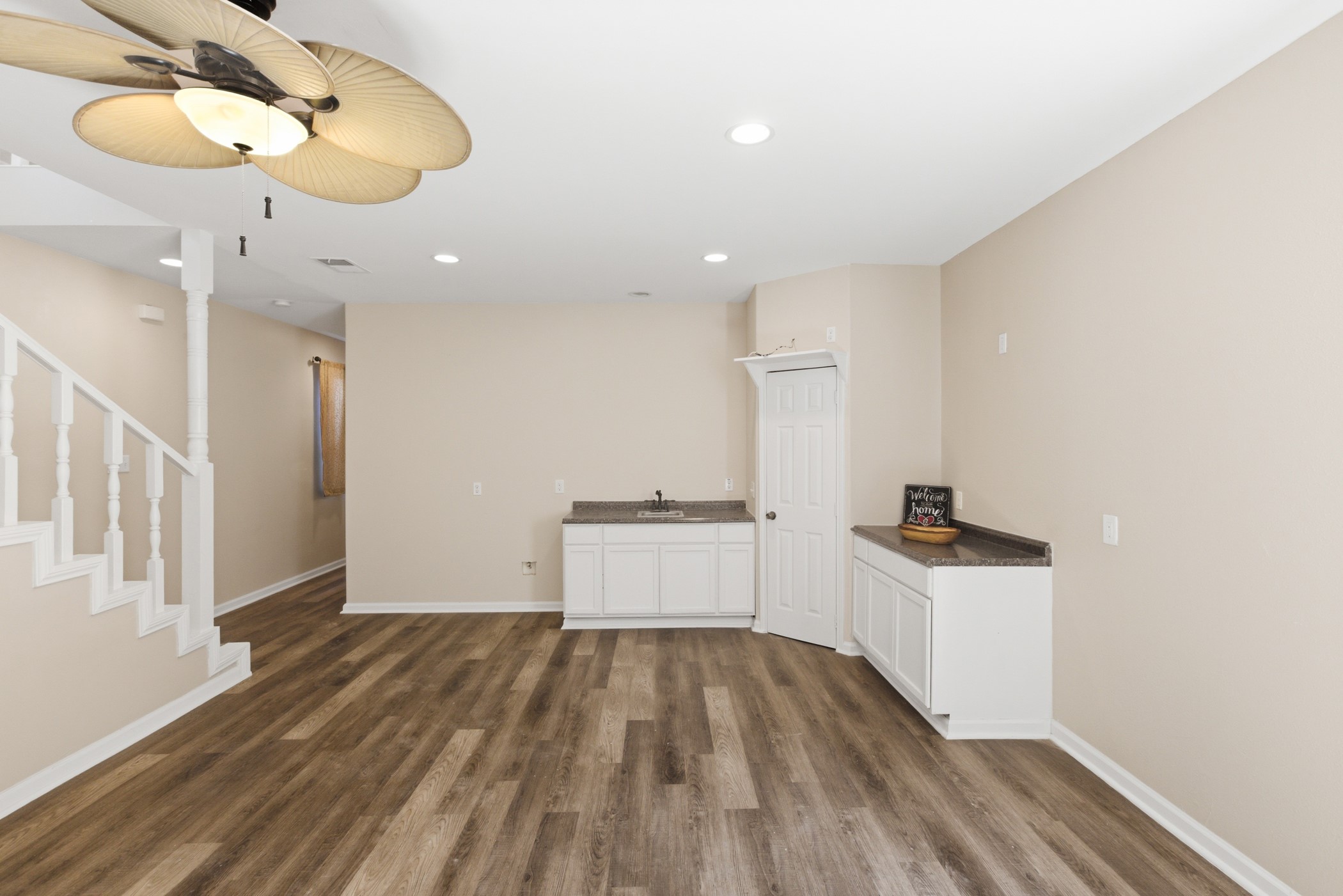 313 Grand Avenue Bacliff, TX 77518 - Photo 16 of 50 a view of a kitchen with a sink and wooden floor