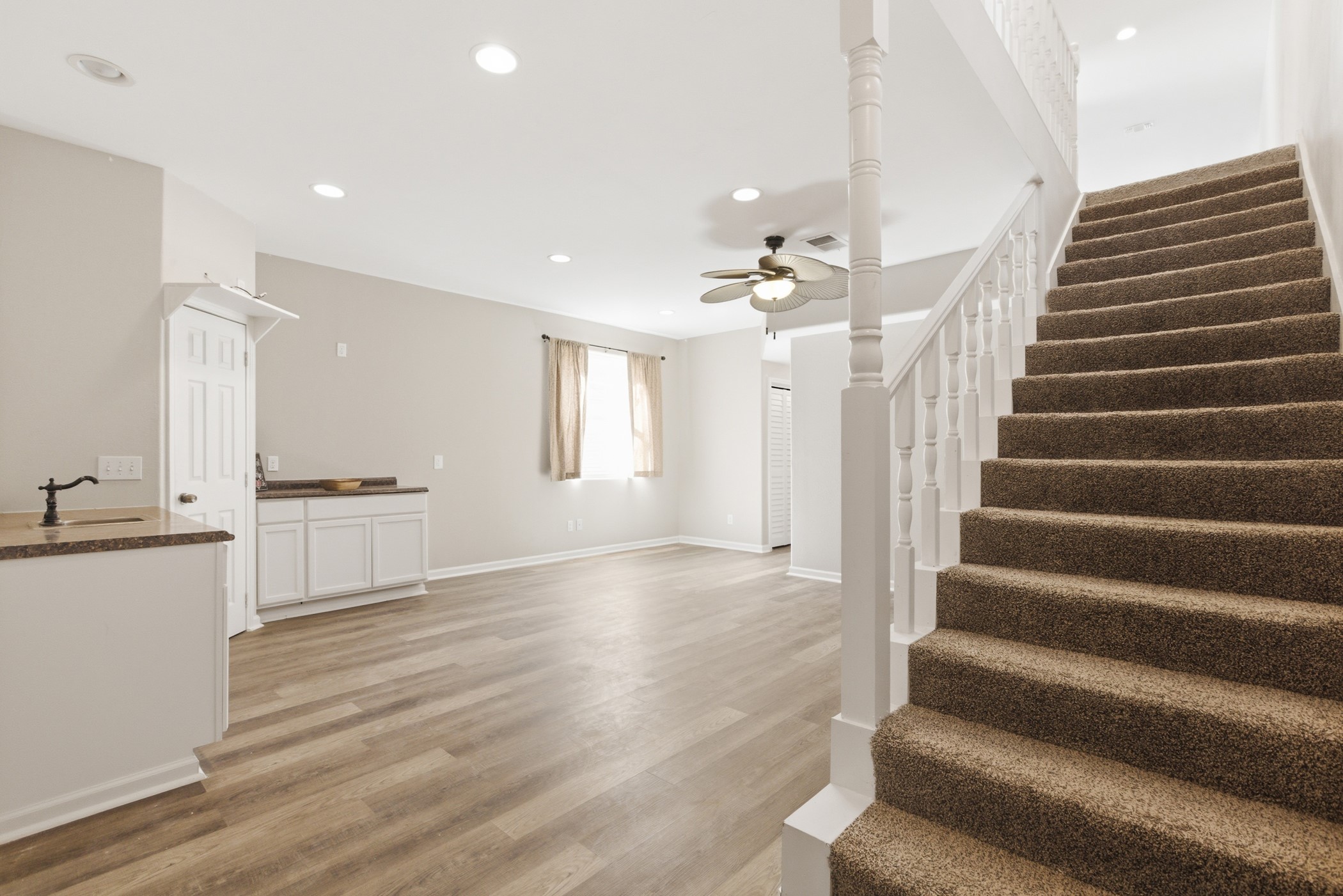 313 Grand Avenue Bacliff, TX 77518 - Photo 18 of 50 a view of an entryway with wooden floor and cabinets
