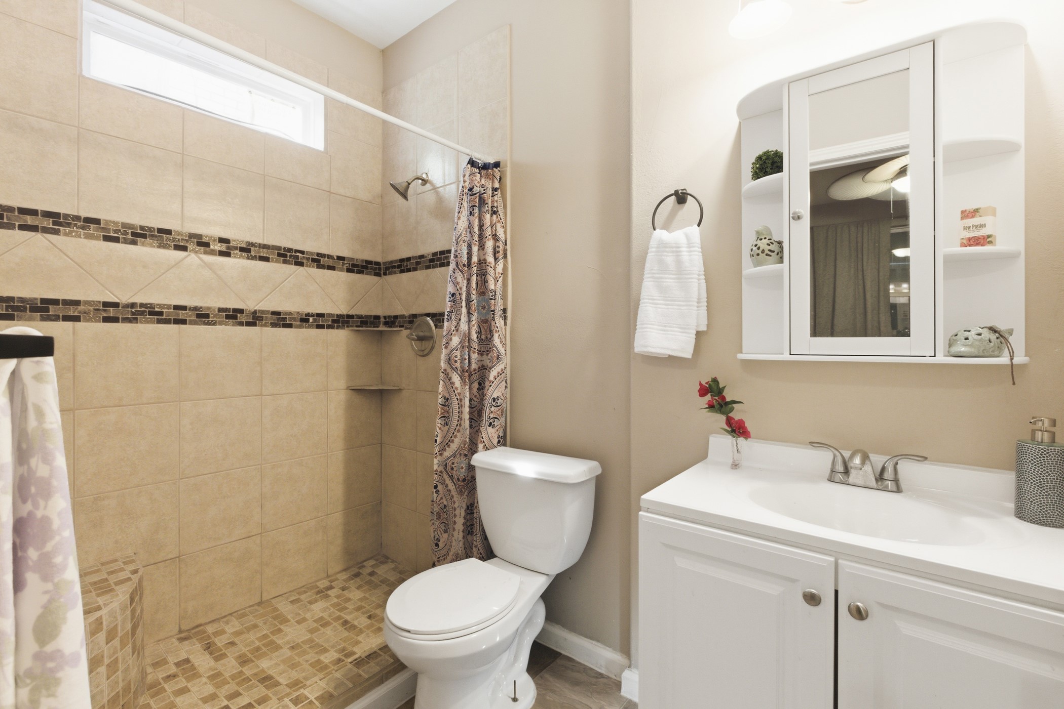 313 Grand Avenue Bacliff, TX 77518 - Photo 20 of 50 a bathroom with a sink toilet and shower