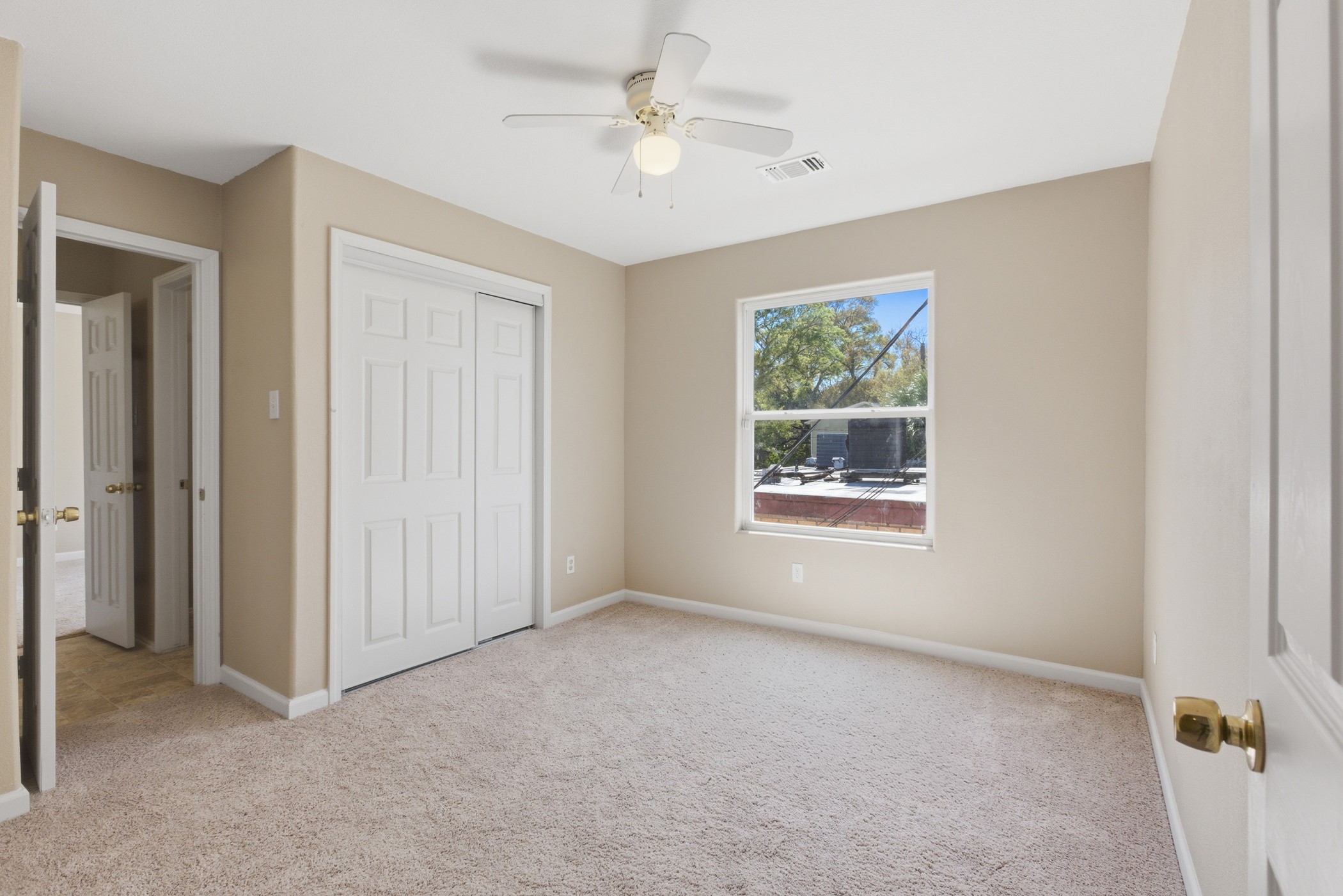 313 Grand Avenue Bacliff, TX 77518 - Photo 34 of 50 a view of an empty room with a window