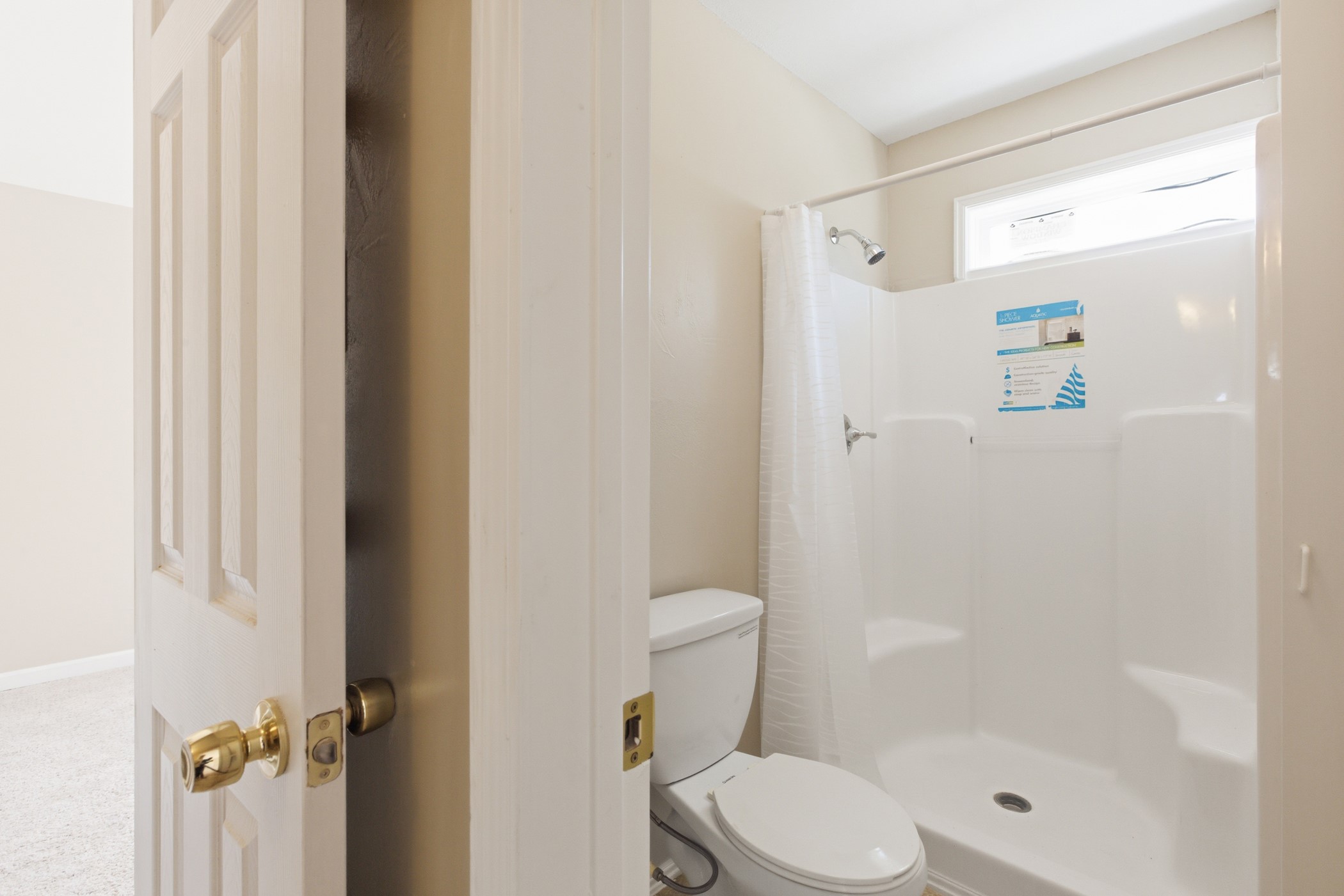313 Grand Avenue Bacliff, TX 77518 - Photo 36 of 50 a white toilet sitting next to a shower