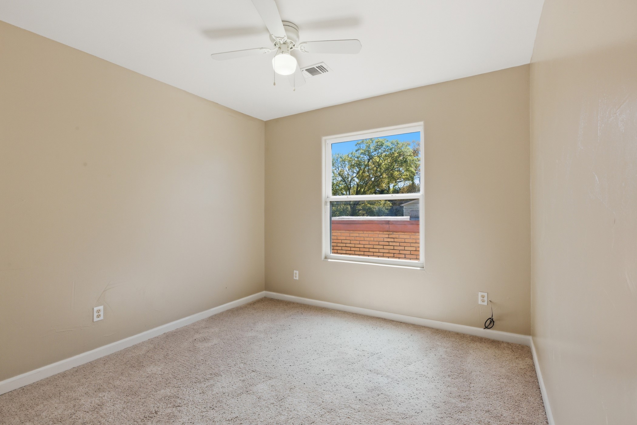 313 Grand Avenue Bacliff, TX 77518 - Photo 37 of 50 an empty room with a window