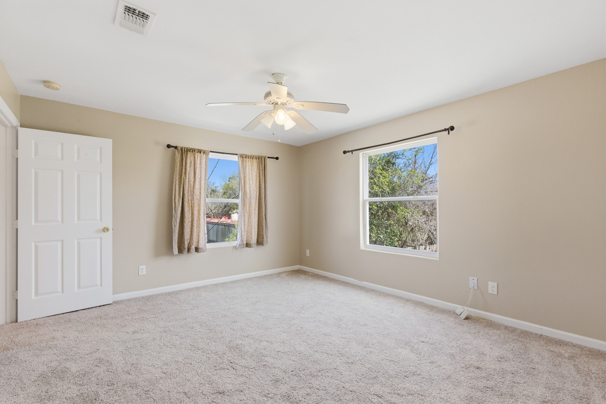 313 Grand Avenue Bacliff, TX 77518 - Photo 43 of 50 a view of an empty room with a window