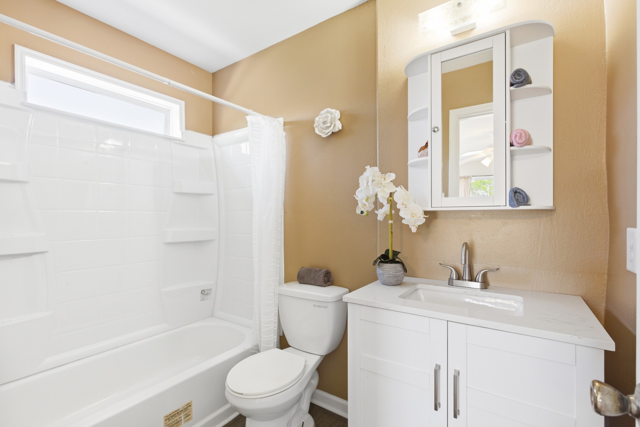 313 Grand Avenue Bacliff, TX 77518 - Photo 44 of 50 a bathroom with a sink a toilet and shower