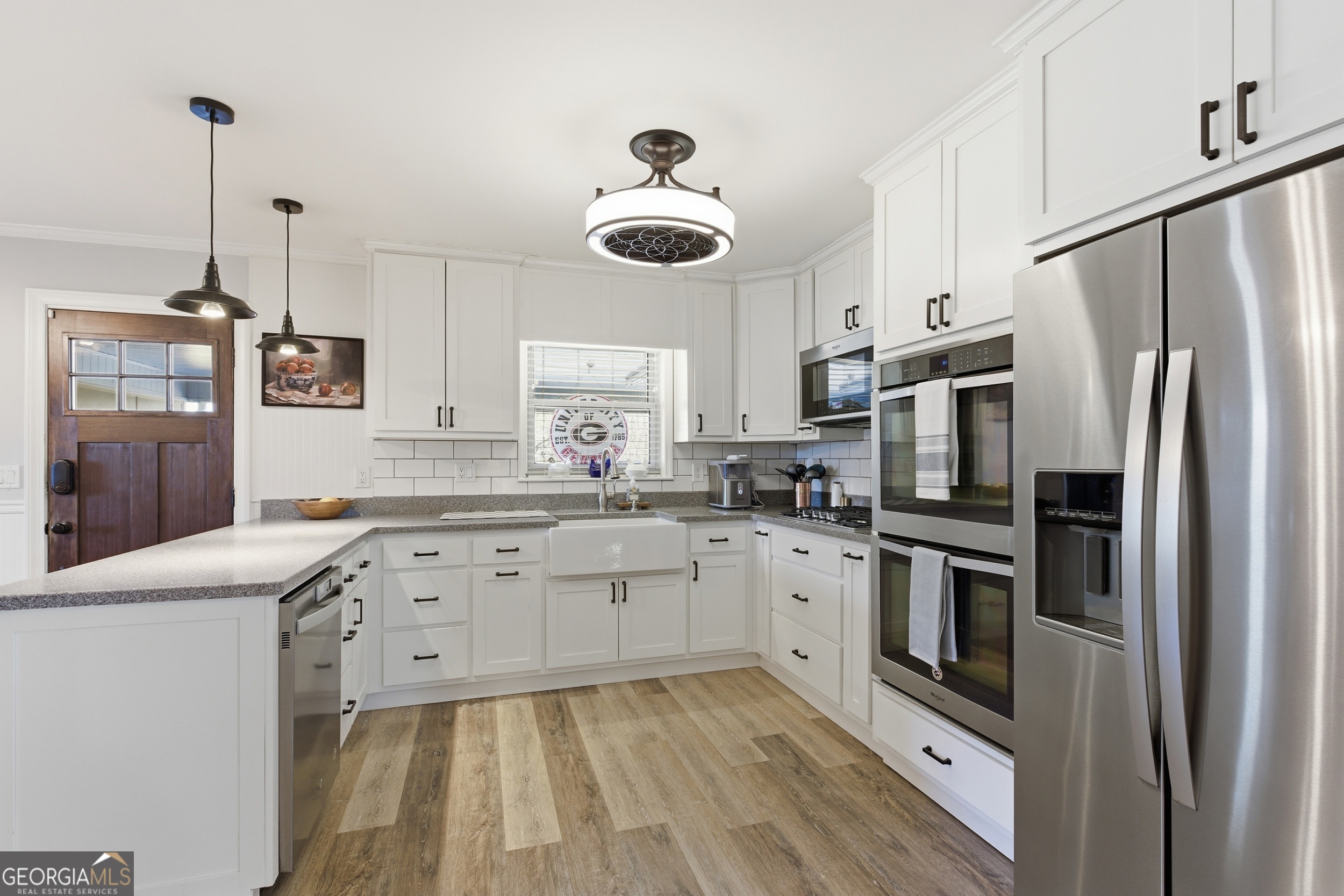 281 Line Road Toccoa, GA 30577 - Photo 17 of 93 a kitchen with stainless steel appliances granite countertop a sink refrigerator and cabinets