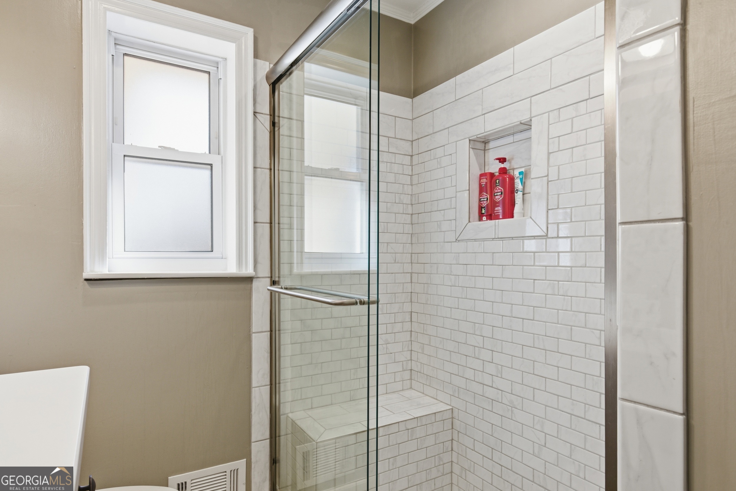 281 Line Road Toccoa, GA 30577 - Photo 29 of 93 a bathroom with a painting on the wall and shower