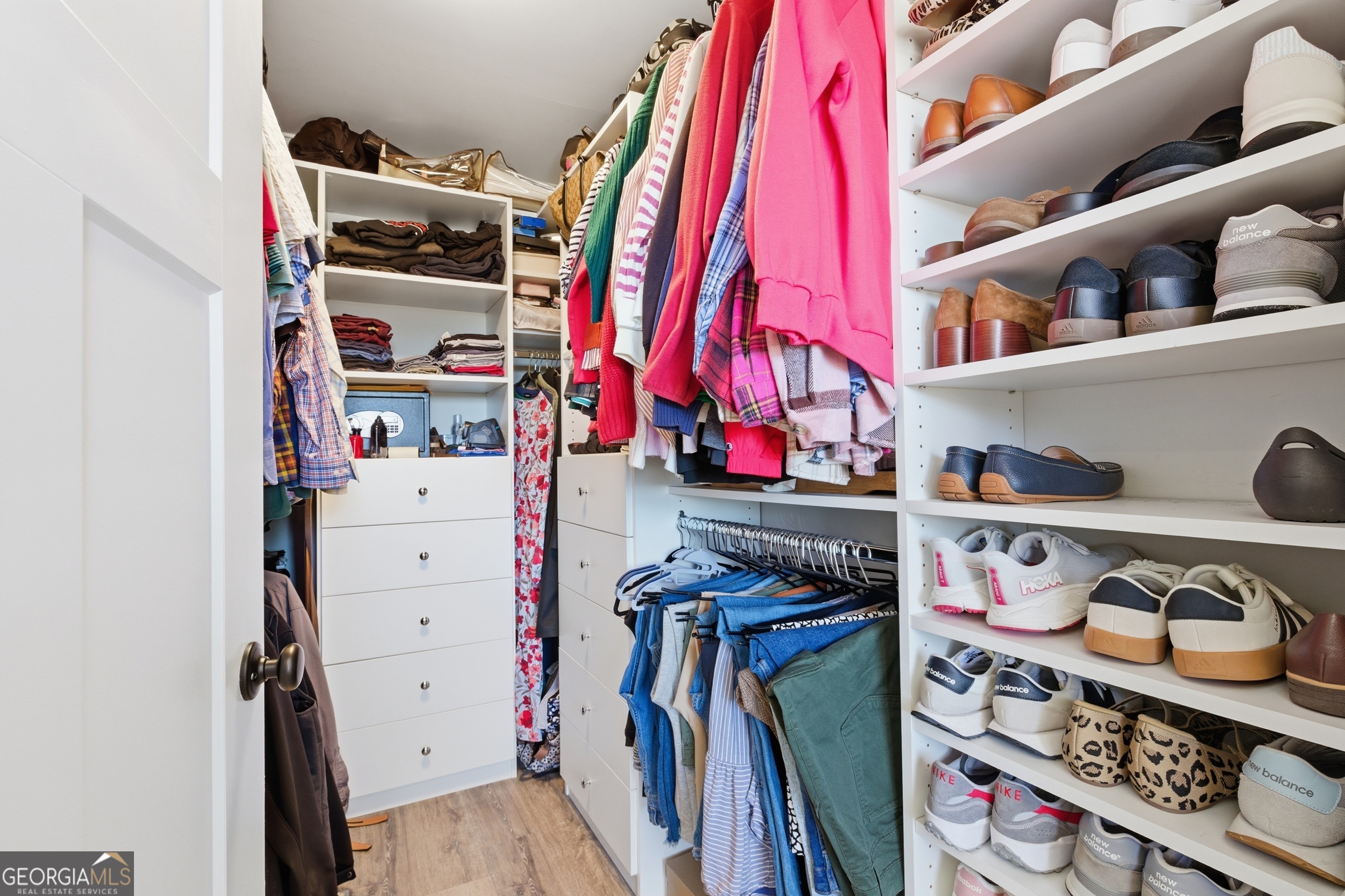 281 Line Road Toccoa, GA 30577 - Photo 38 of 93 a view of walk in closet with clothes and shoes