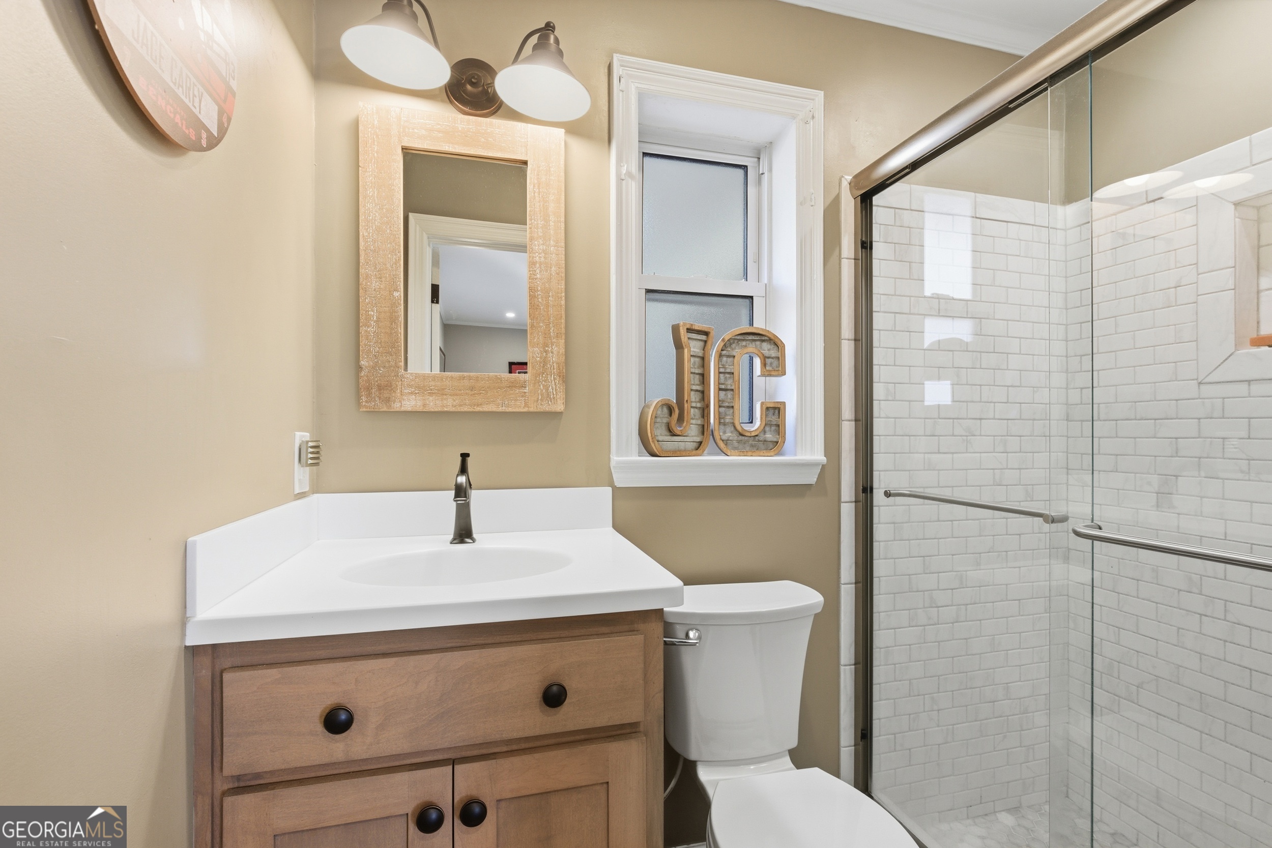 281 Line Road Toccoa, GA 30577 - Photo 42 of 93 a bathroom with a sink mirror and toilet