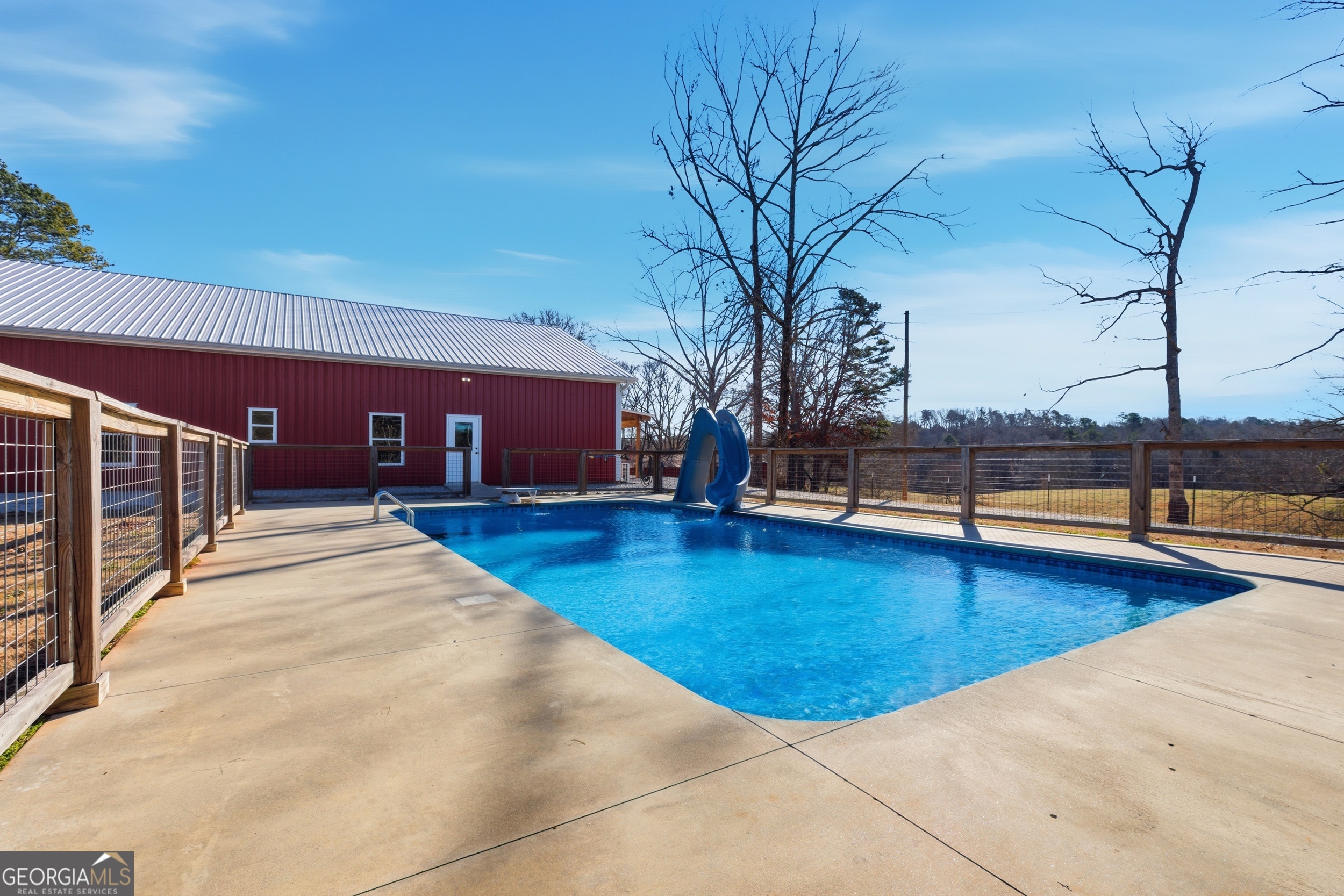281 Line Road Toccoa, GA 30577 - Photo 59 of 93 a view of a swimming pool with an outdoor seating