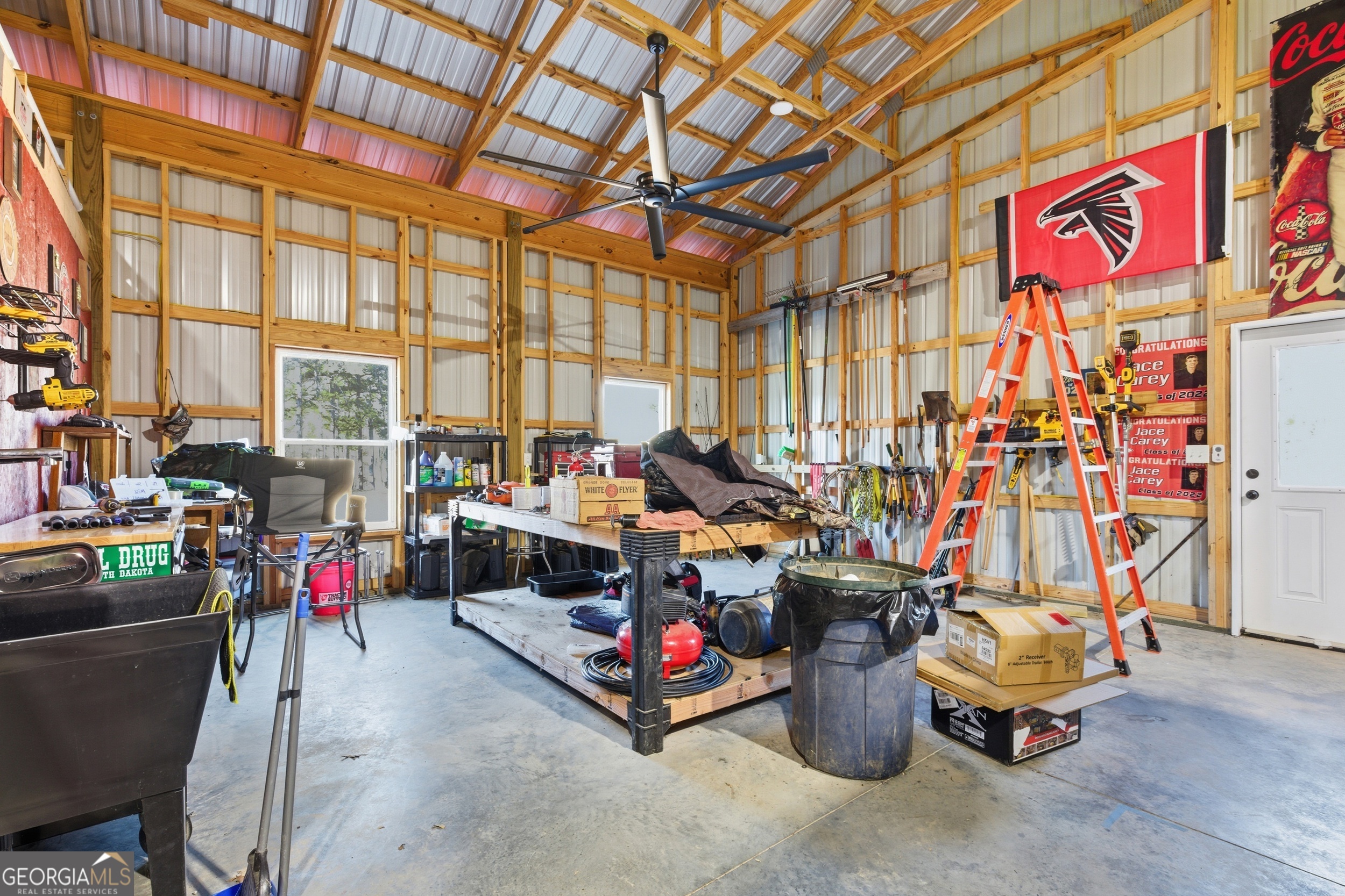 281 Line Road Toccoa, GA 30577 - Photo 67 of 93 a living room with lots of furniture and a chandelier