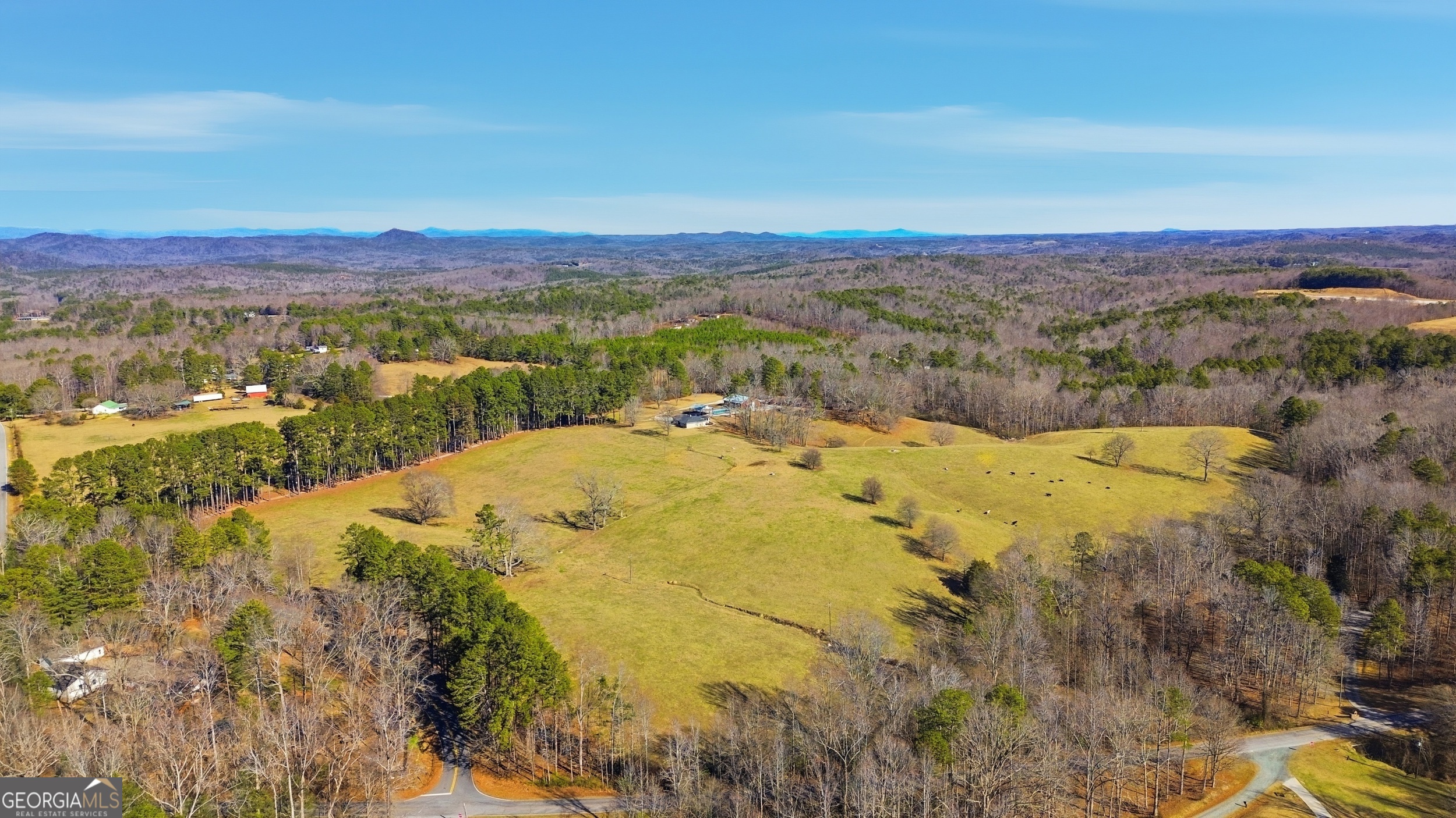 281 Line Road Toccoa, GA 30577 - Photo 83 of 93 a view of a lake with mountains in the background