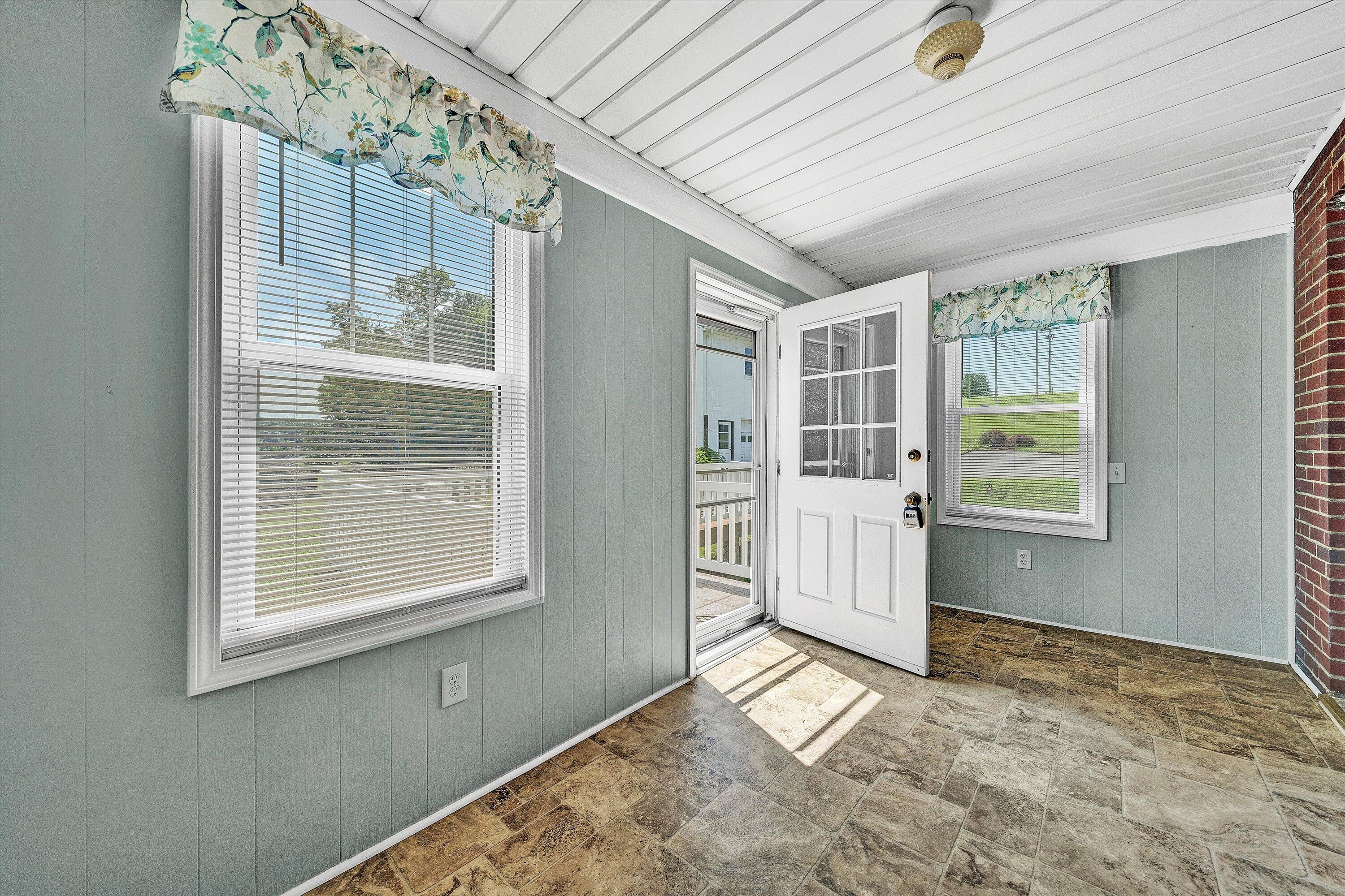 77 Mountain Pass Road Blue Ridge, VA 24064 - Photo 26 of 42 a view of an empty room with a window