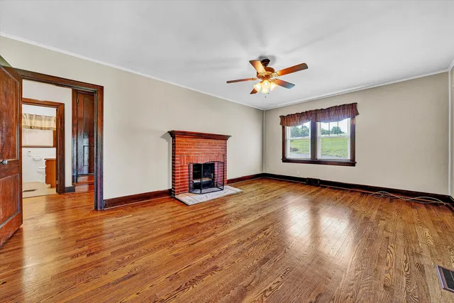 a bathroom with a sink toilet and mirror