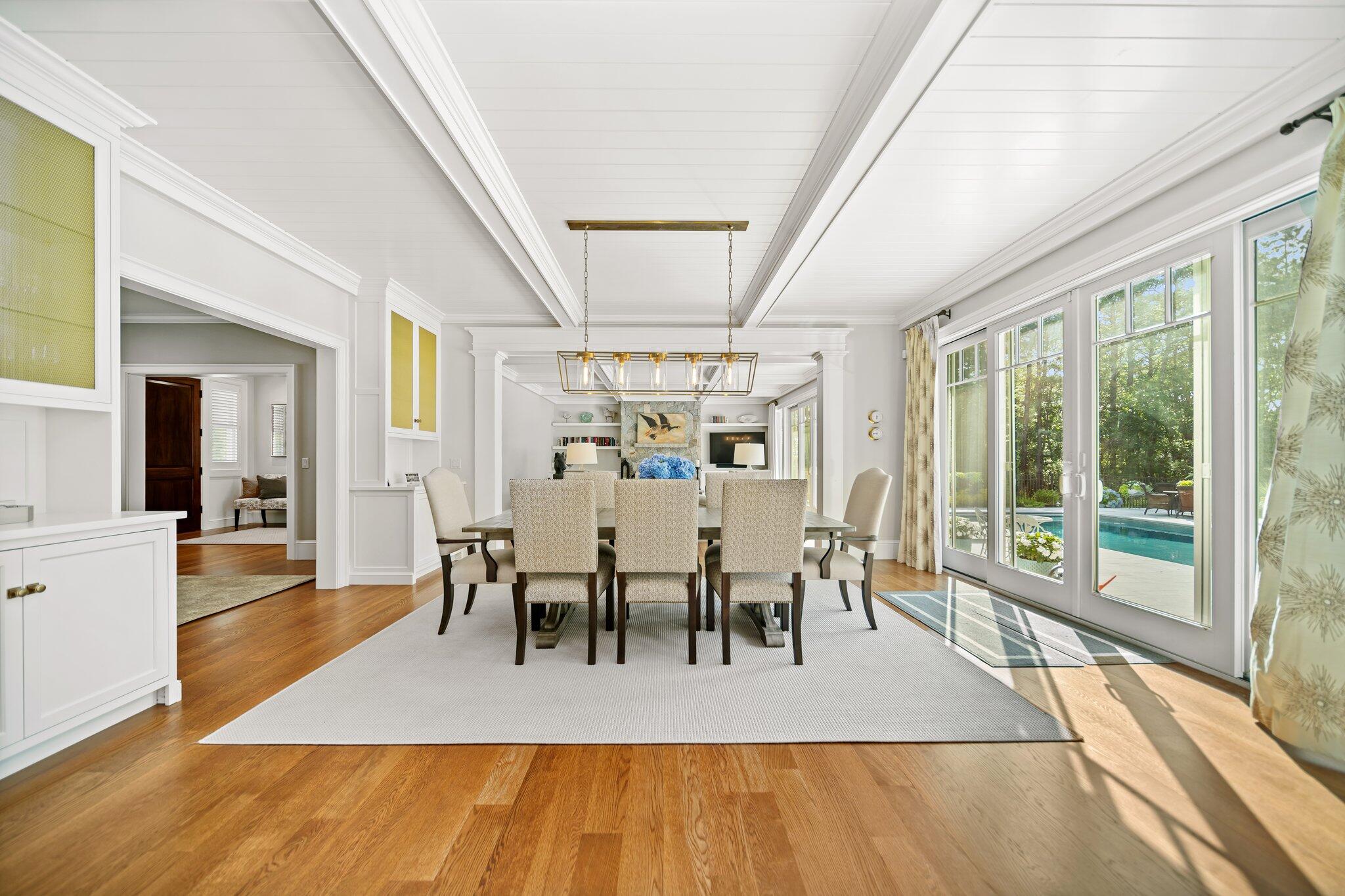 444 Vineyard Road Cotuit, MA 02635 - Photo 19 of 59 a view of a dining room with furniture window and wooden floor