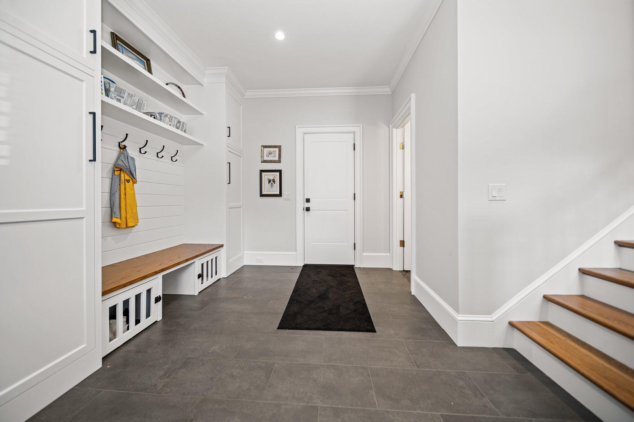 444 Vineyard Road Cotuit, MA 02635 - Photo 37 of 59 a kitchen with stainless steel appliances a white stove top oven and a refrigerator