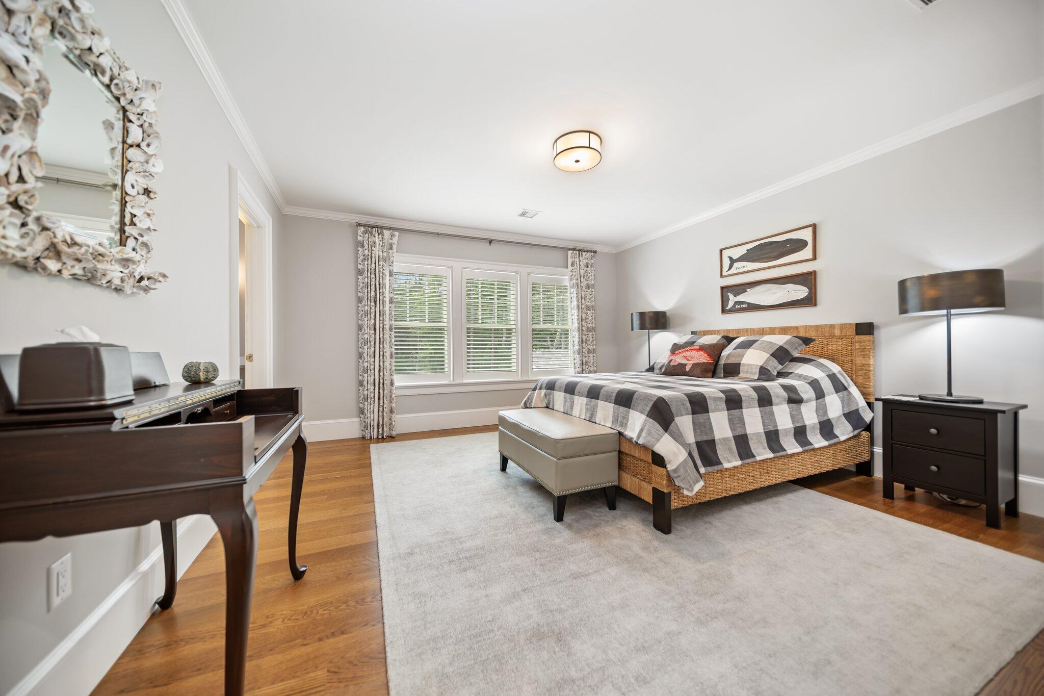 444 Vineyard Road Cotuit, MA 02635 - Photo 53 of 59 a bedroom with a bed and a desk