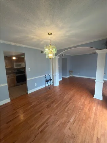 a view of a livingroom with a furniture