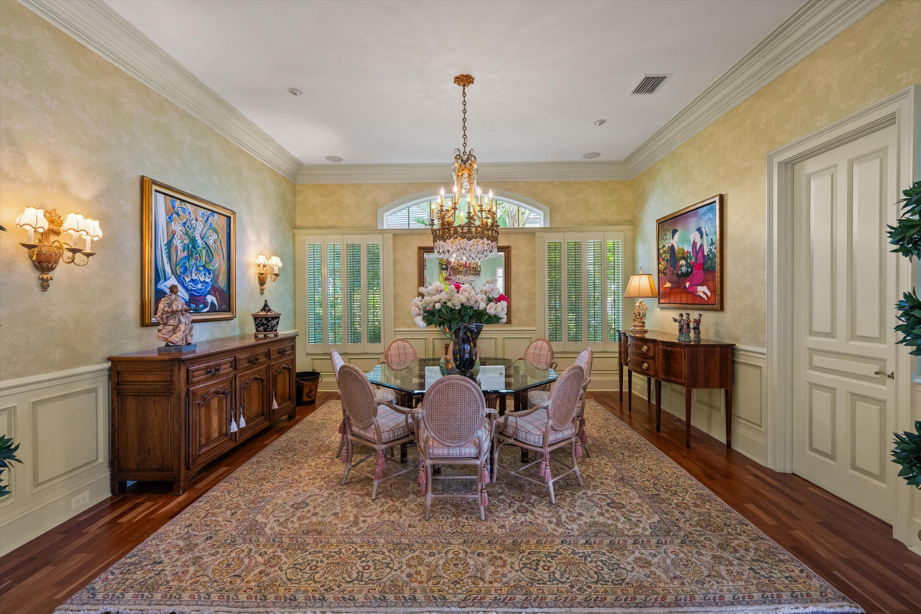 258 Locha Drive Jupiter, FL 33458 - Photo 11 of 76 a view of a dining room with furniture window and wooden floor