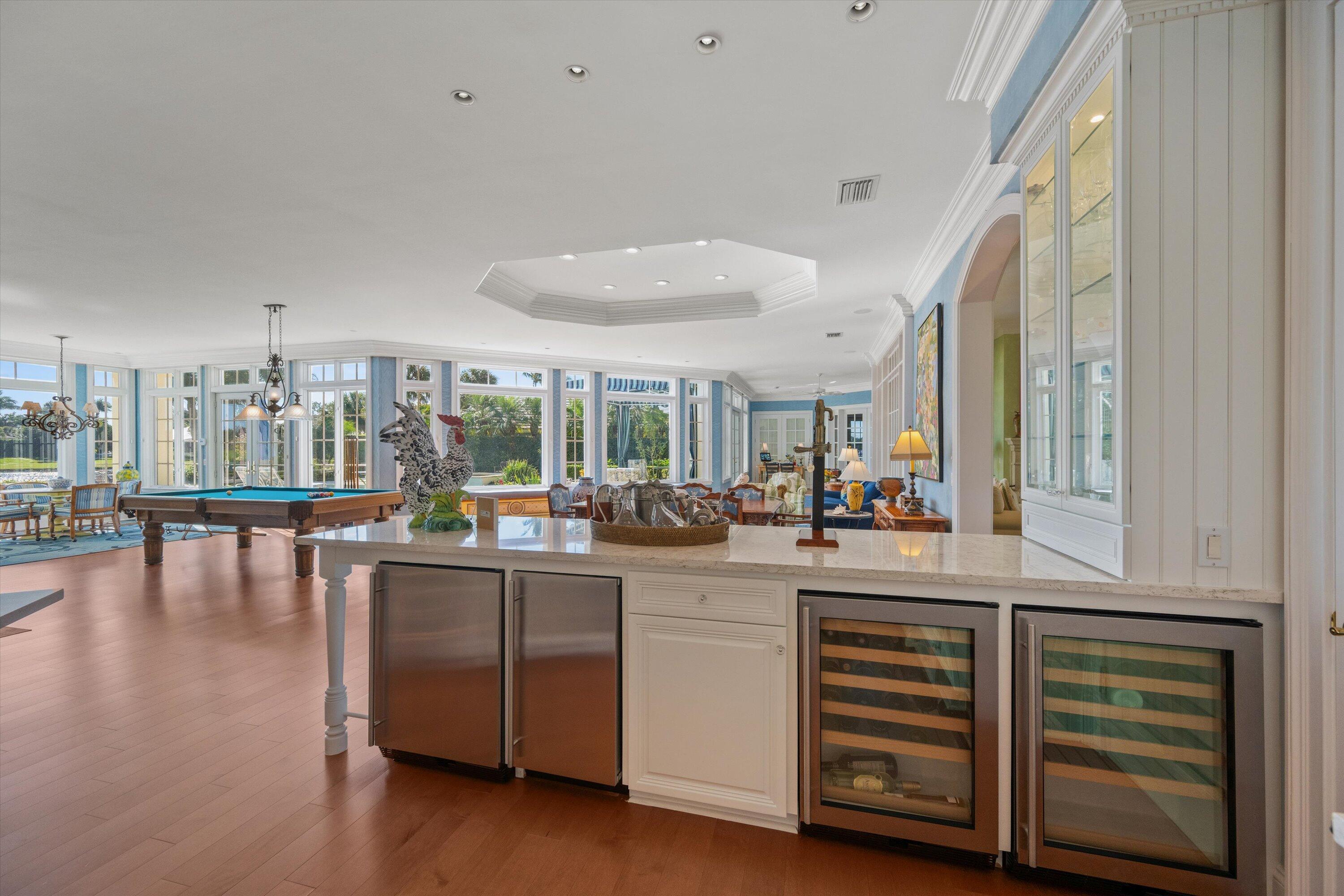258 Locha Drive Jupiter, FL 33458 - Photo 20 of 76 a kitchen with sink and cabinets