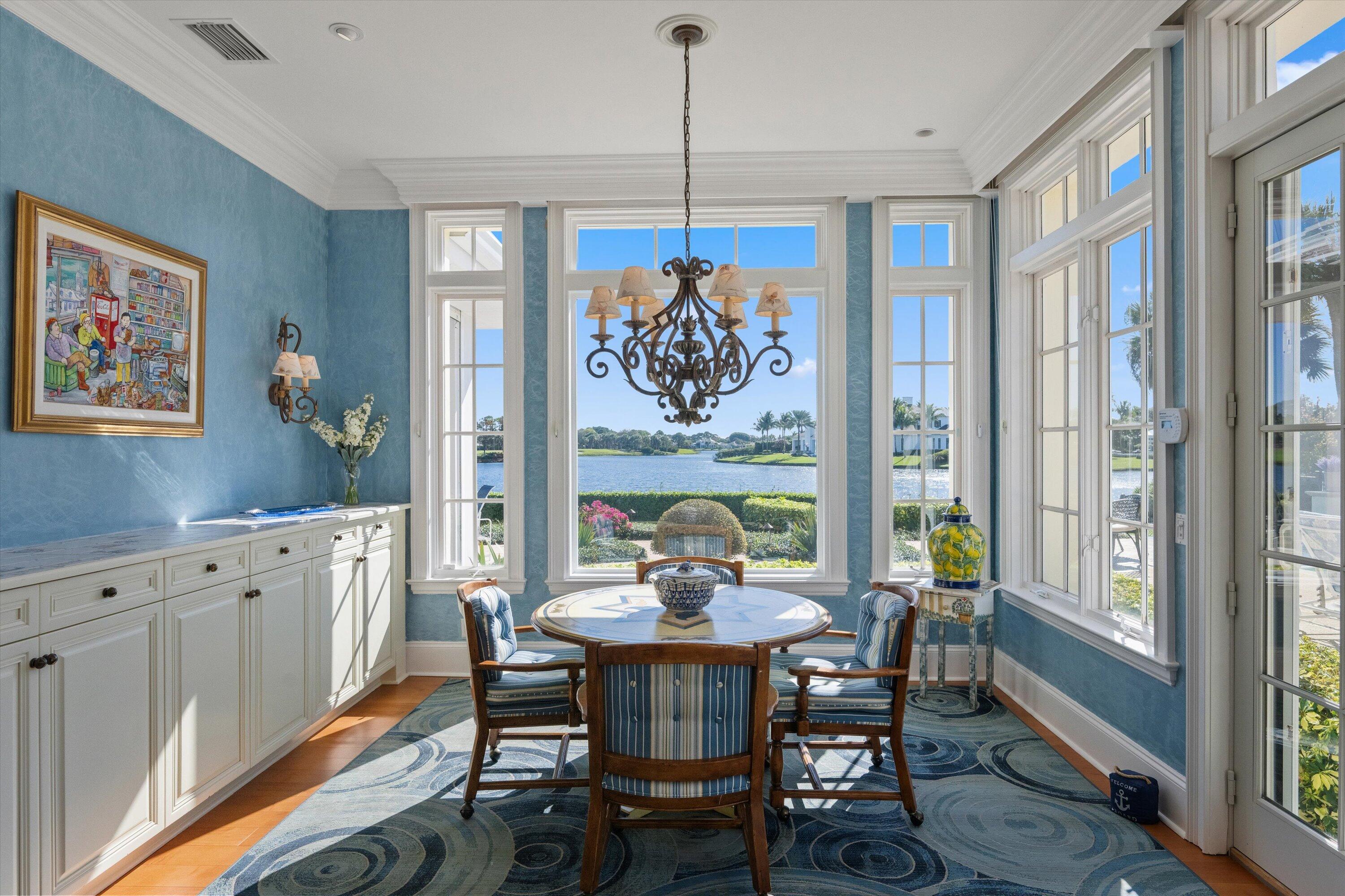 258 Locha Drive Jupiter, FL 33458 - Photo 23 of 76 a view of a dining room with furniture window and outside view