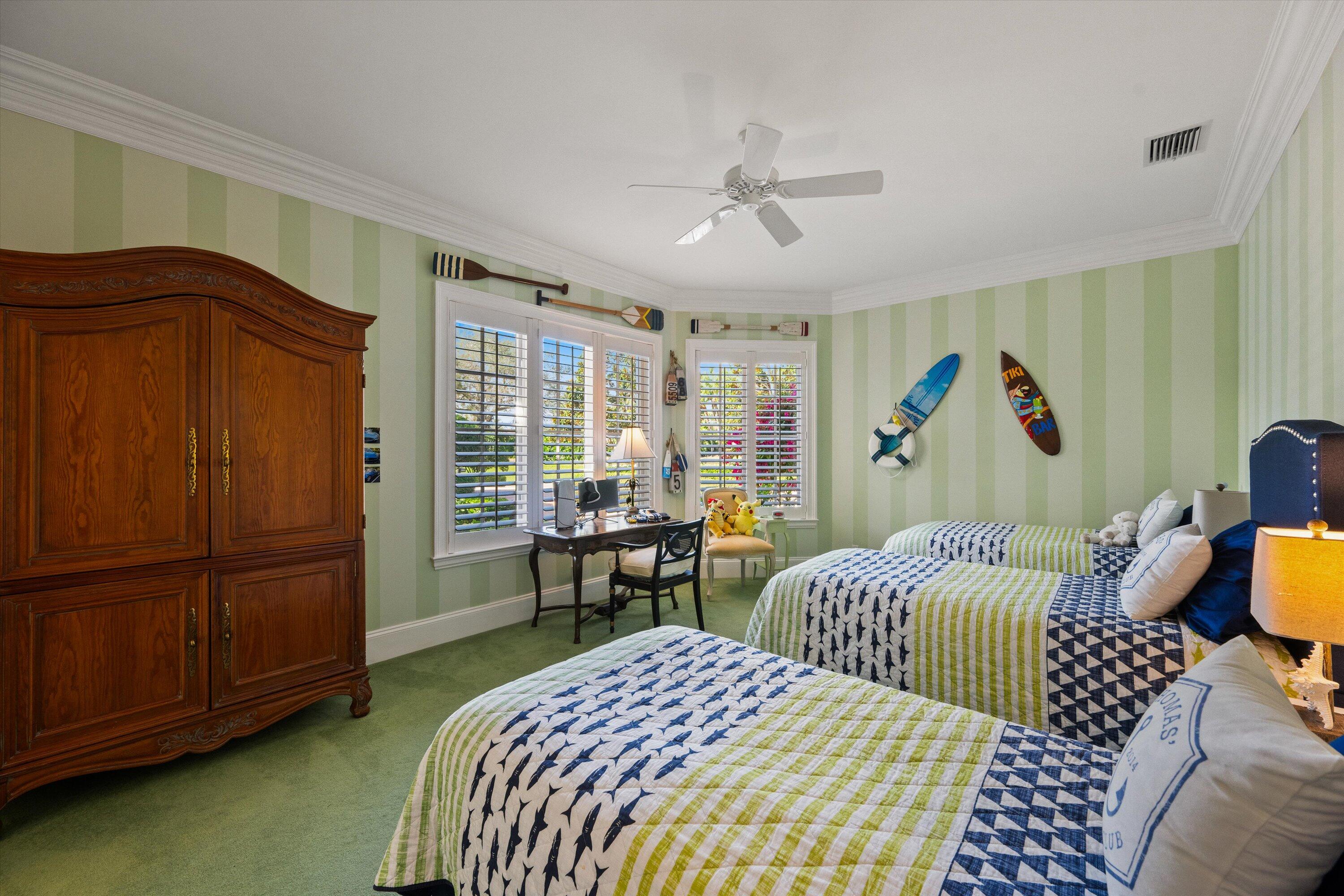 258 Locha Drive Jupiter, FL 33458 - Photo 42 of 76 a bedroom with double bed and a window