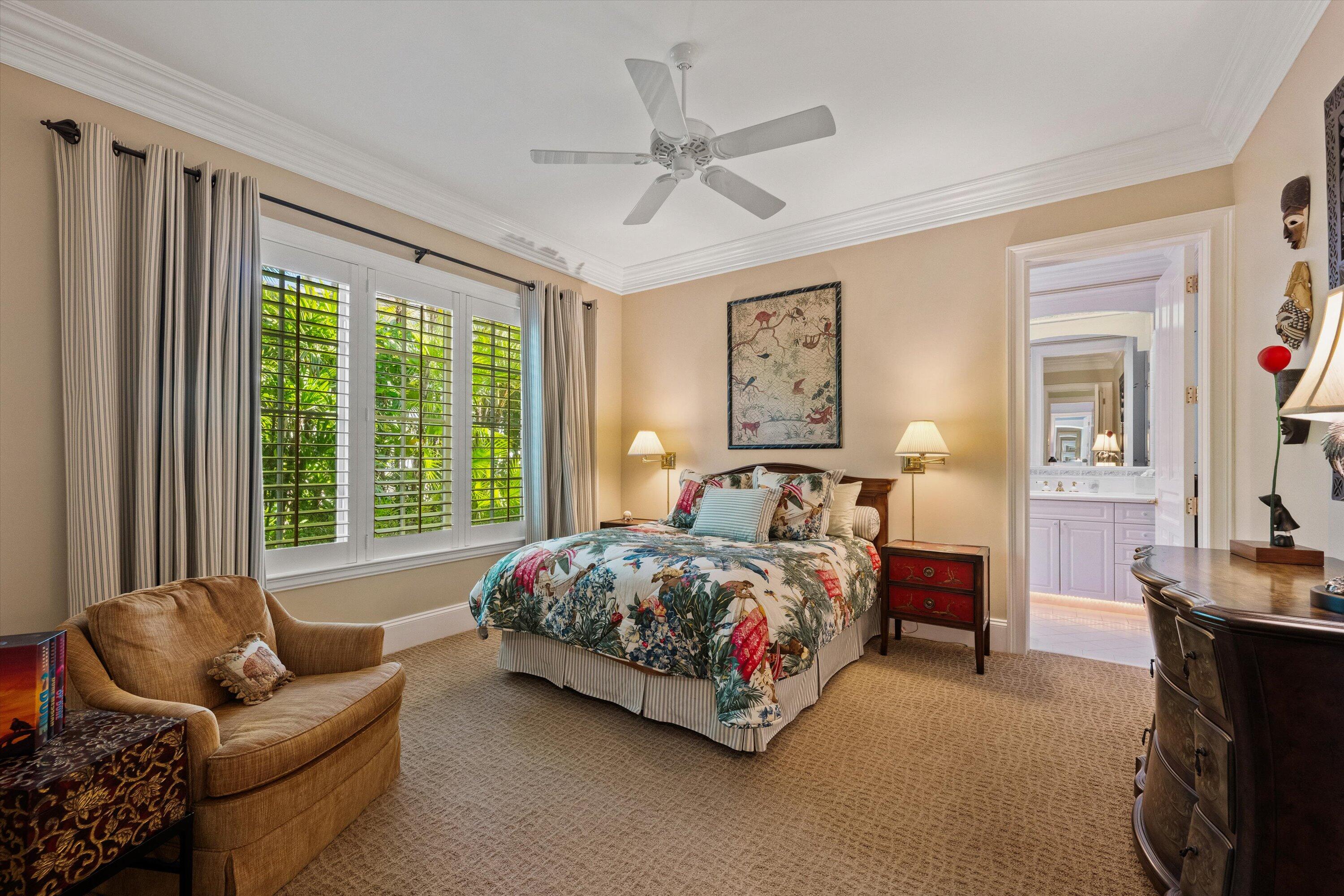 258 Locha Drive Jupiter, FL 33458 - Photo 46 of 76 a bedroom with bed couch and window