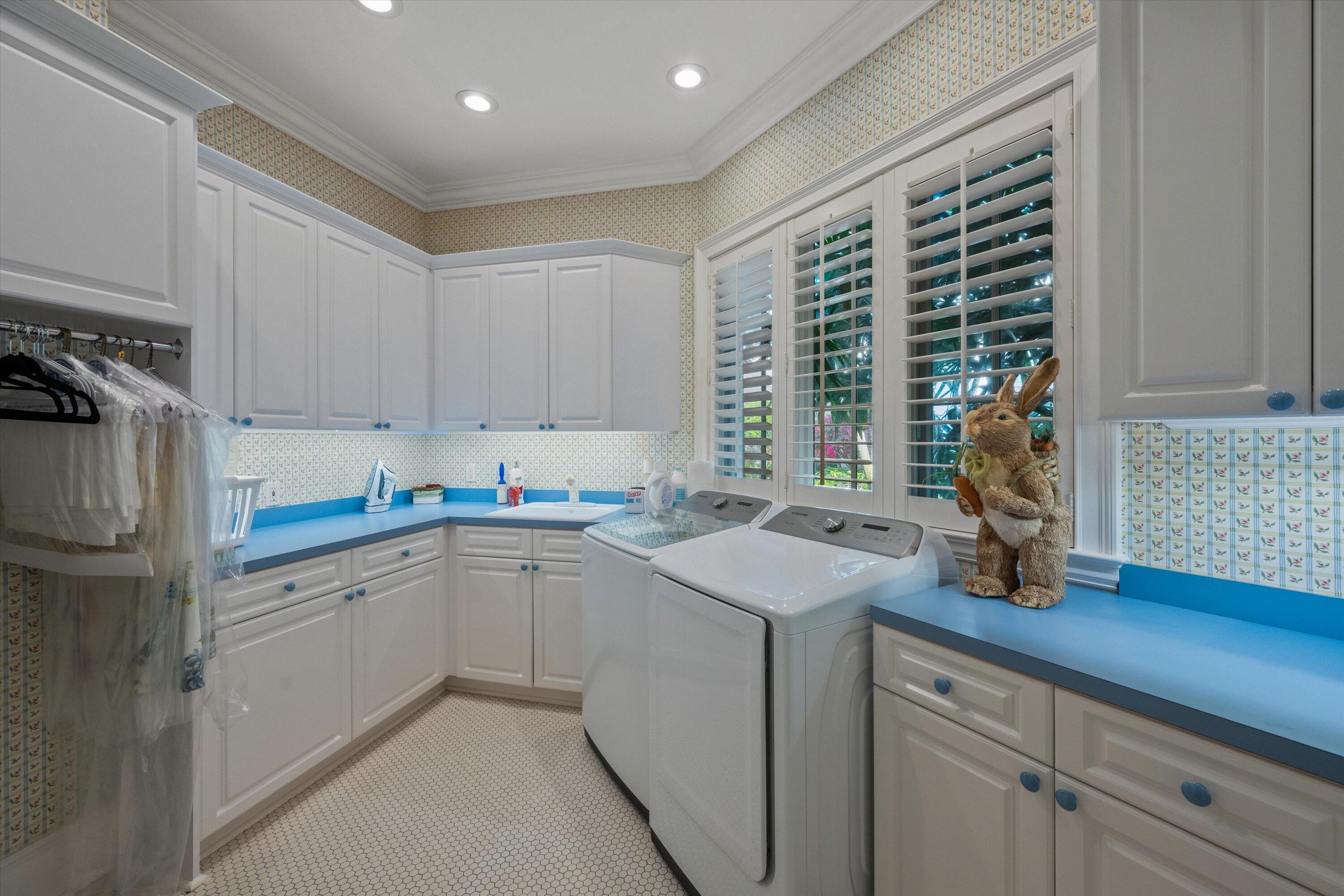 258 Locha Drive Jupiter, FL 33458 - Photo 53 of 76 a kitchen with a sink cabinets and window