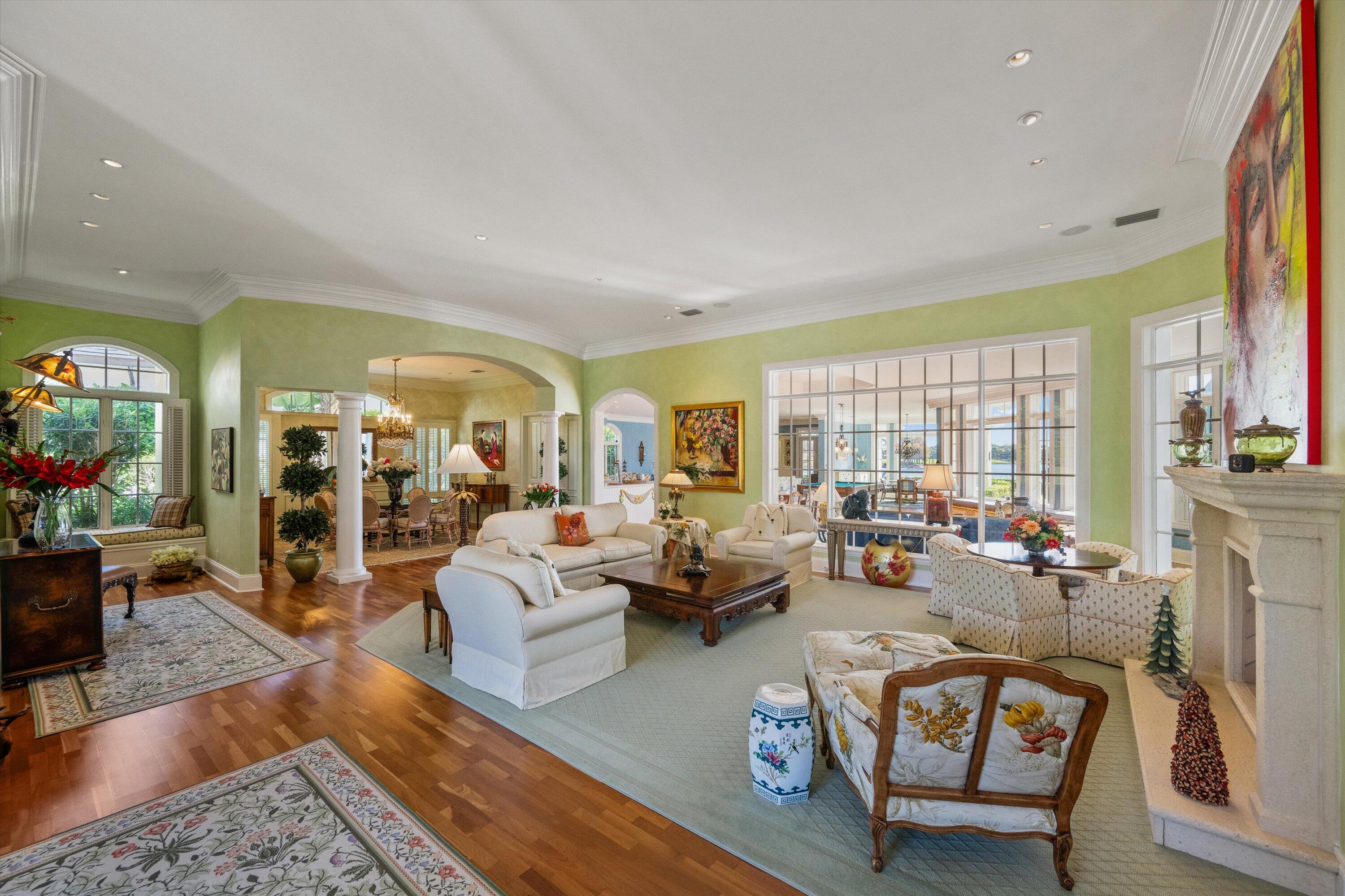 258 Locha Drive Jupiter, FL 33458 - Photo 7 of 76 a living room with furniture and a large window
