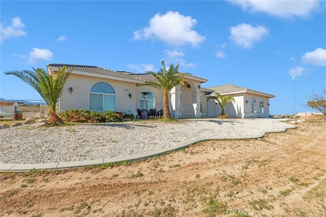 a view of a house with a snow