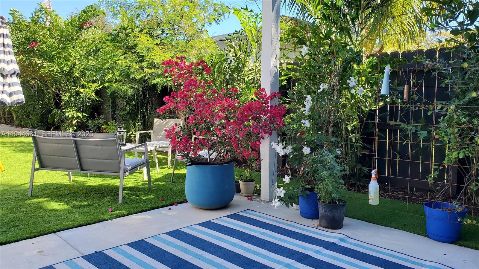 740 Southwest 9th Street, Unit 1 Miami, FL 33130 - Photo 21 of 34 a view of a backyard with sitting area