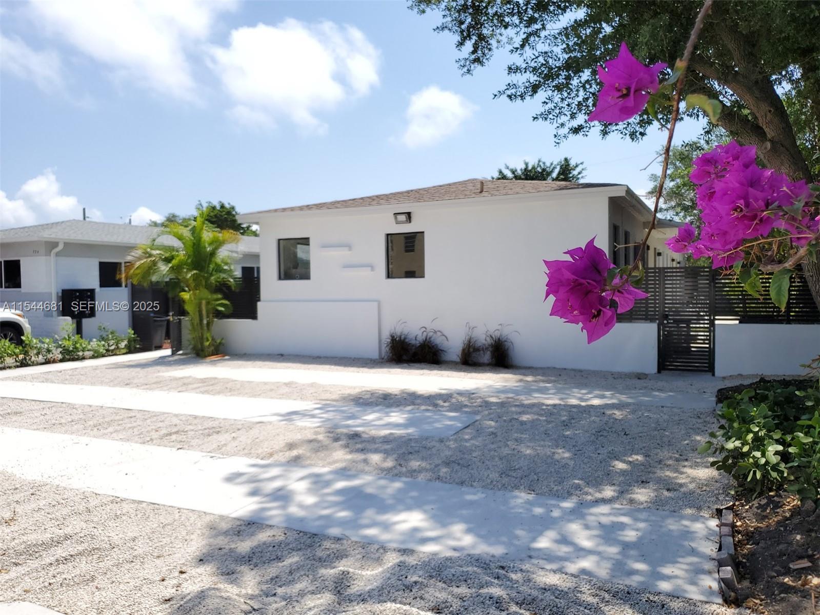 740 Southwest 9th Street, Unit 1 Miami, FL 33130 - Photo 32 of 34 a view of a house with a street