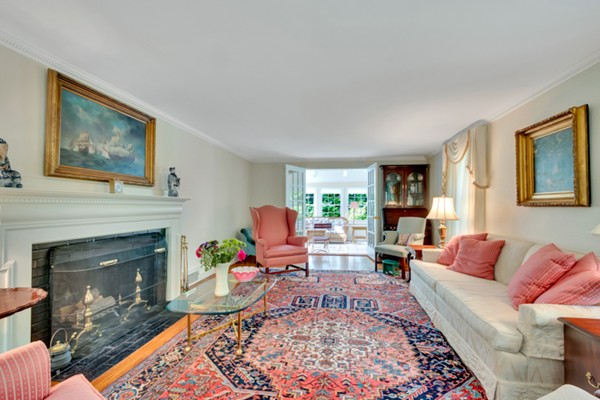 120 Cliff Road Wellesley, MA 02481 - Photo 5 of 25 a living room with furniture and a fireplace