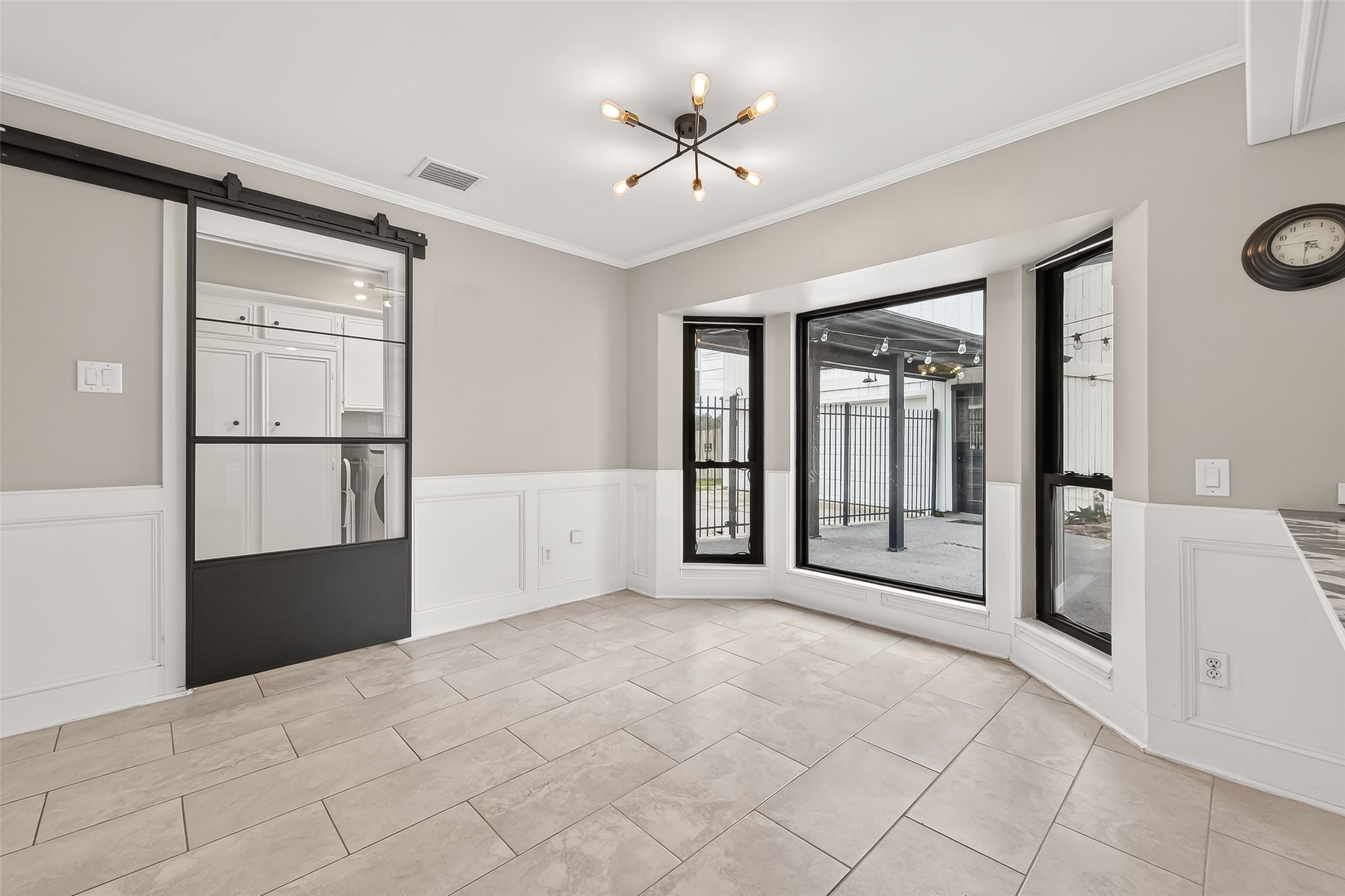 707 Montclair Boulevard Sugar Land, TX 77478 - Photo 13 of 50 a view of a livingroom with a ceiling fan and window