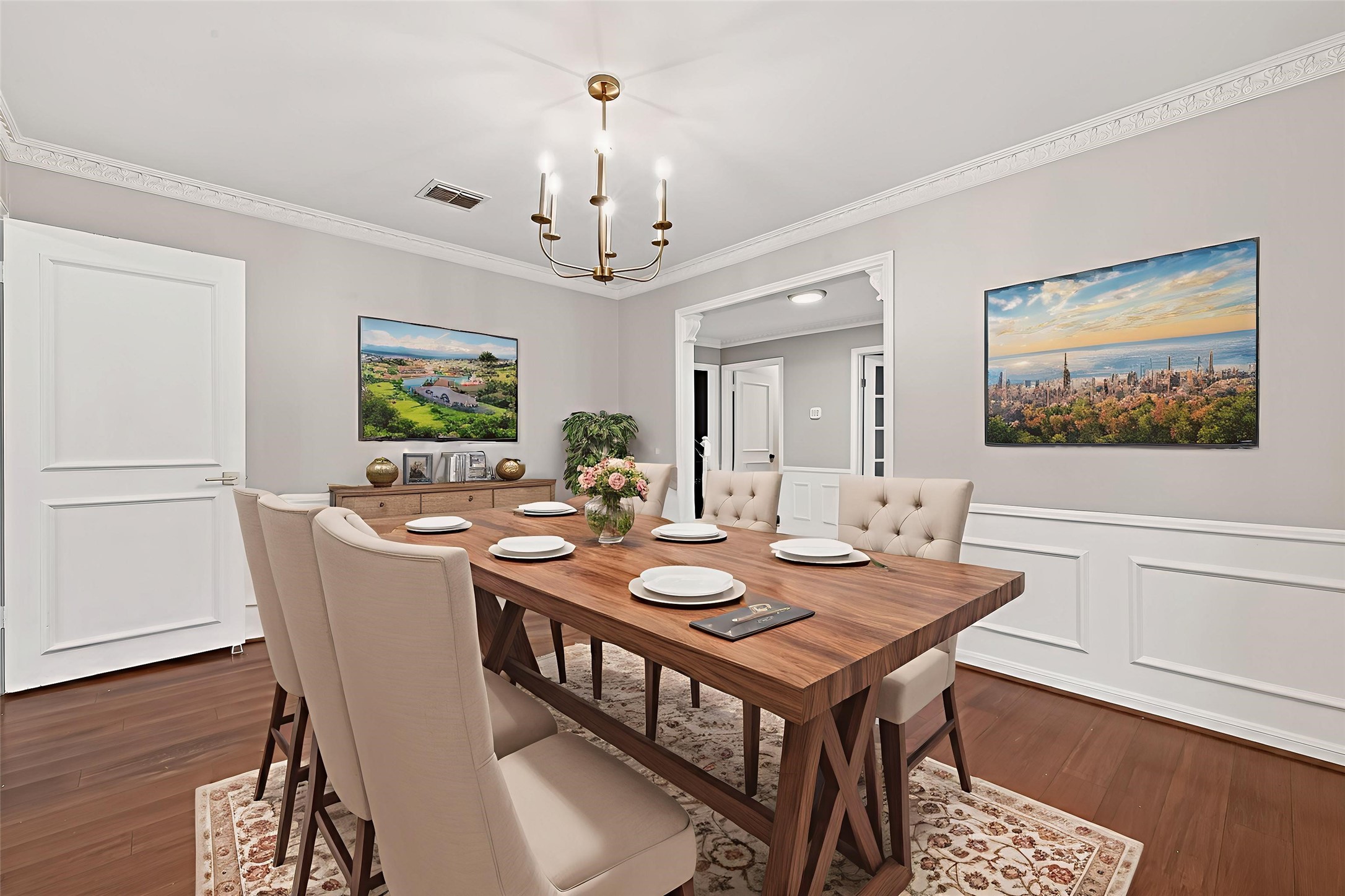 707 Montclair Boulevard Sugar Land, TX 77478 - Photo 18 of 50 a view of a dining room with furniture a chandelier and wooden floor