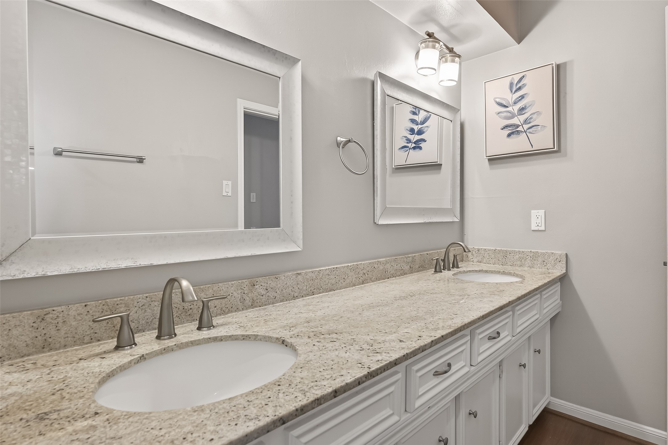 707 Montclair Boulevard Sugar Land, TX 77478 - Photo 27 of 50 a bathroom with a granite countertop sink and a mirror
