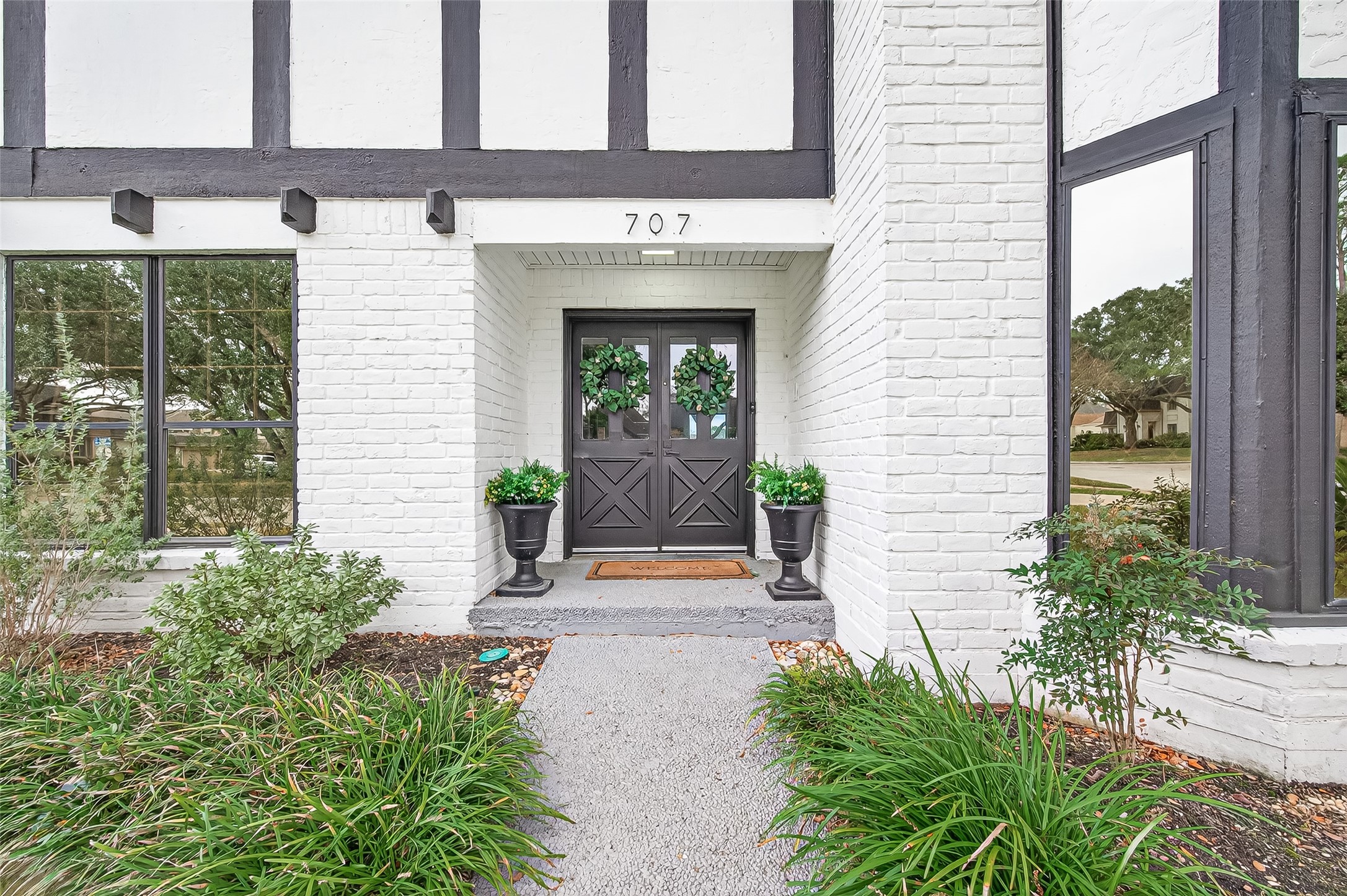 707 Montclair Boulevard Sugar Land, TX 77478 - Photo 3 of 50 a view of a house with potted plants