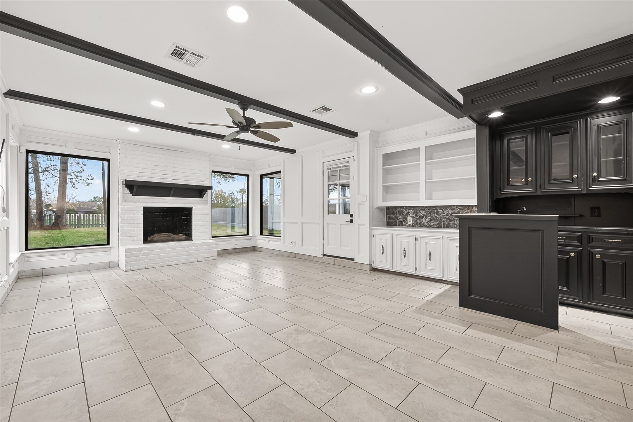 707 Montclair Boulevard Sugar Land, TX 77478 - Photo 6 of 50 a open kitchen with cabinets and stainless steel appliances